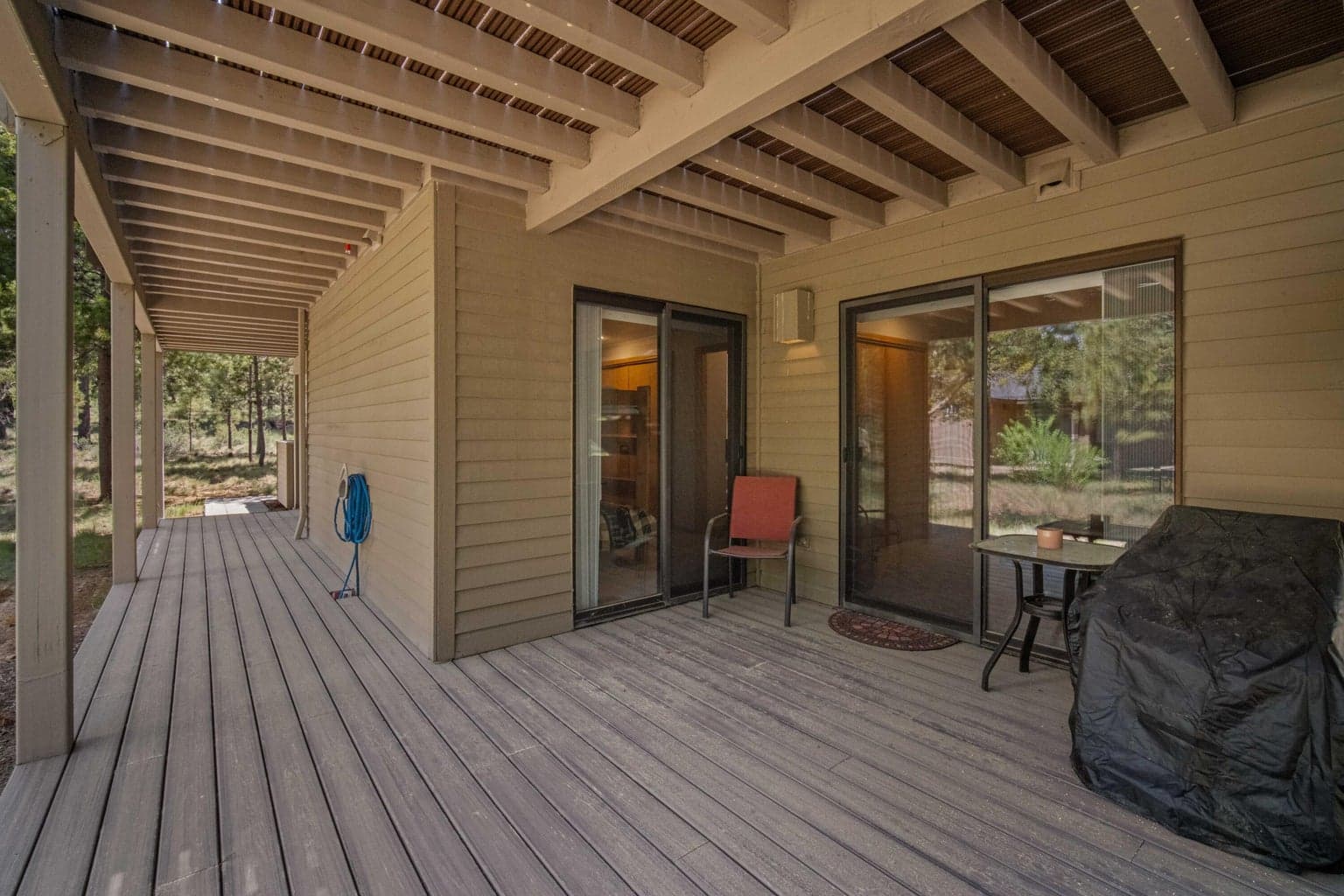 Covered lower Trex deck extends the outdoor living options below the main deck.