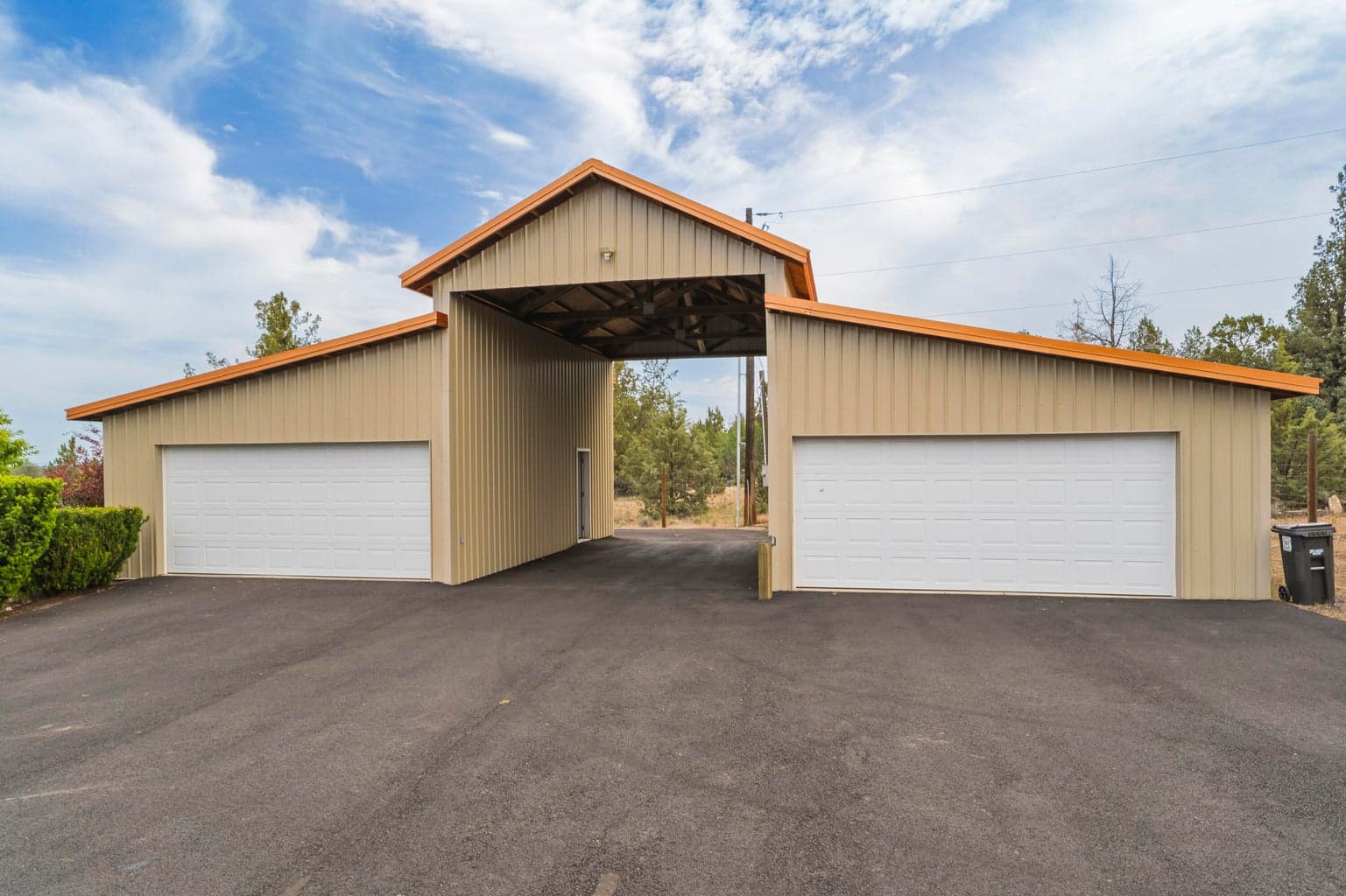 Covered RV parking with hookups. Two 2-car garages