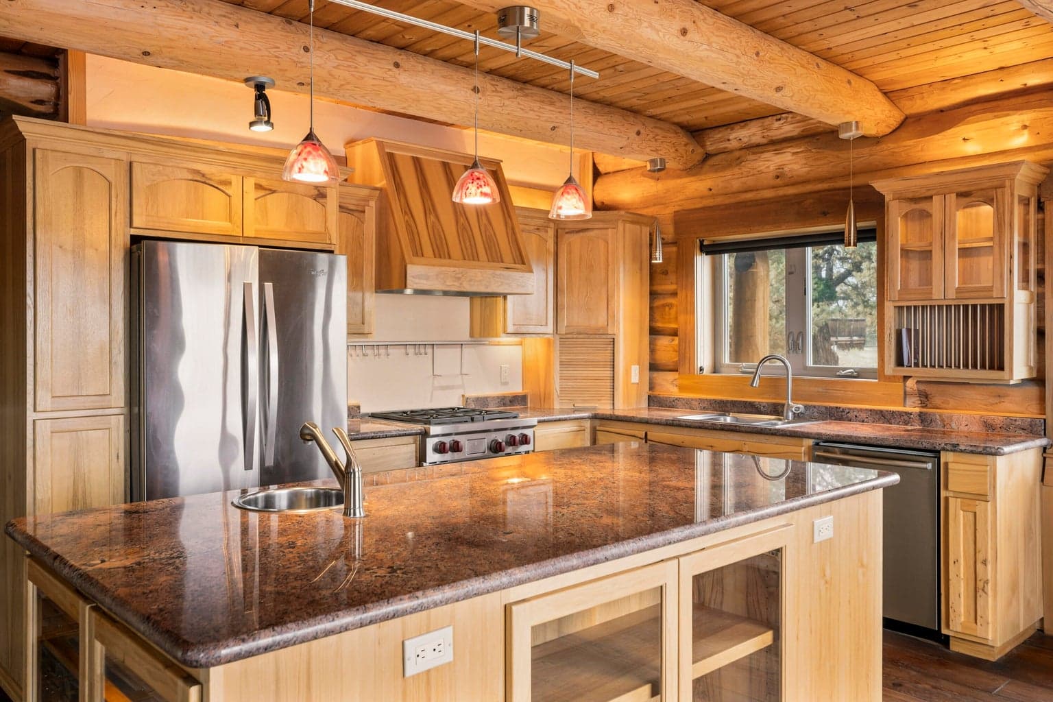 Open concept kitchen with granite island