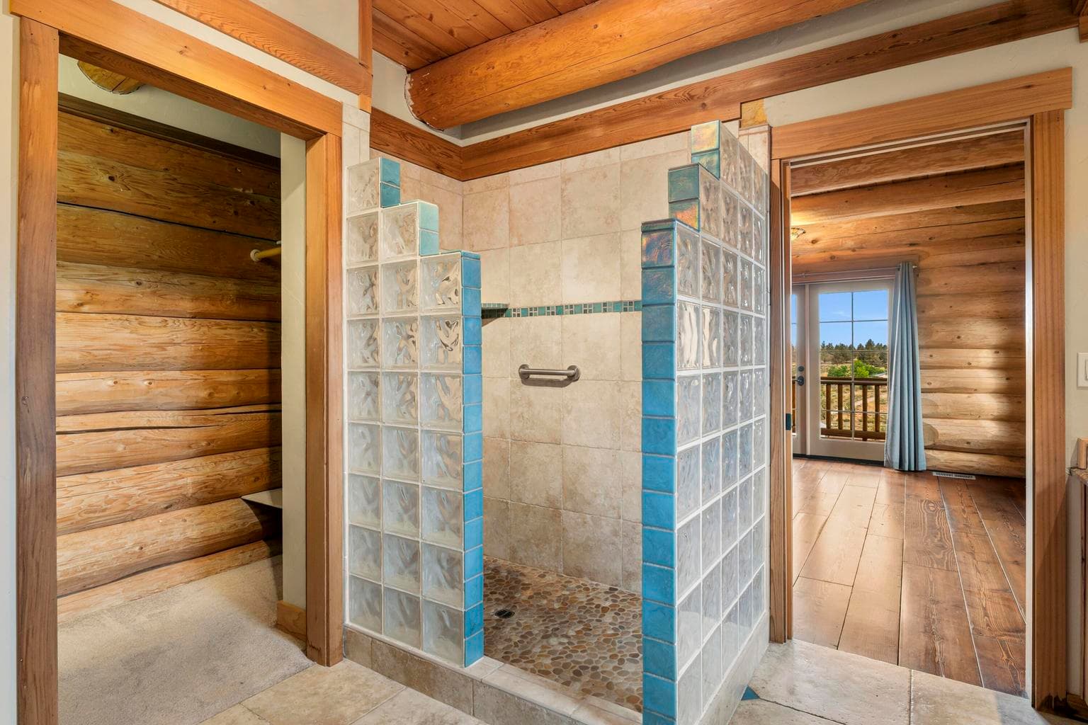 Walk in shower with glass block walls