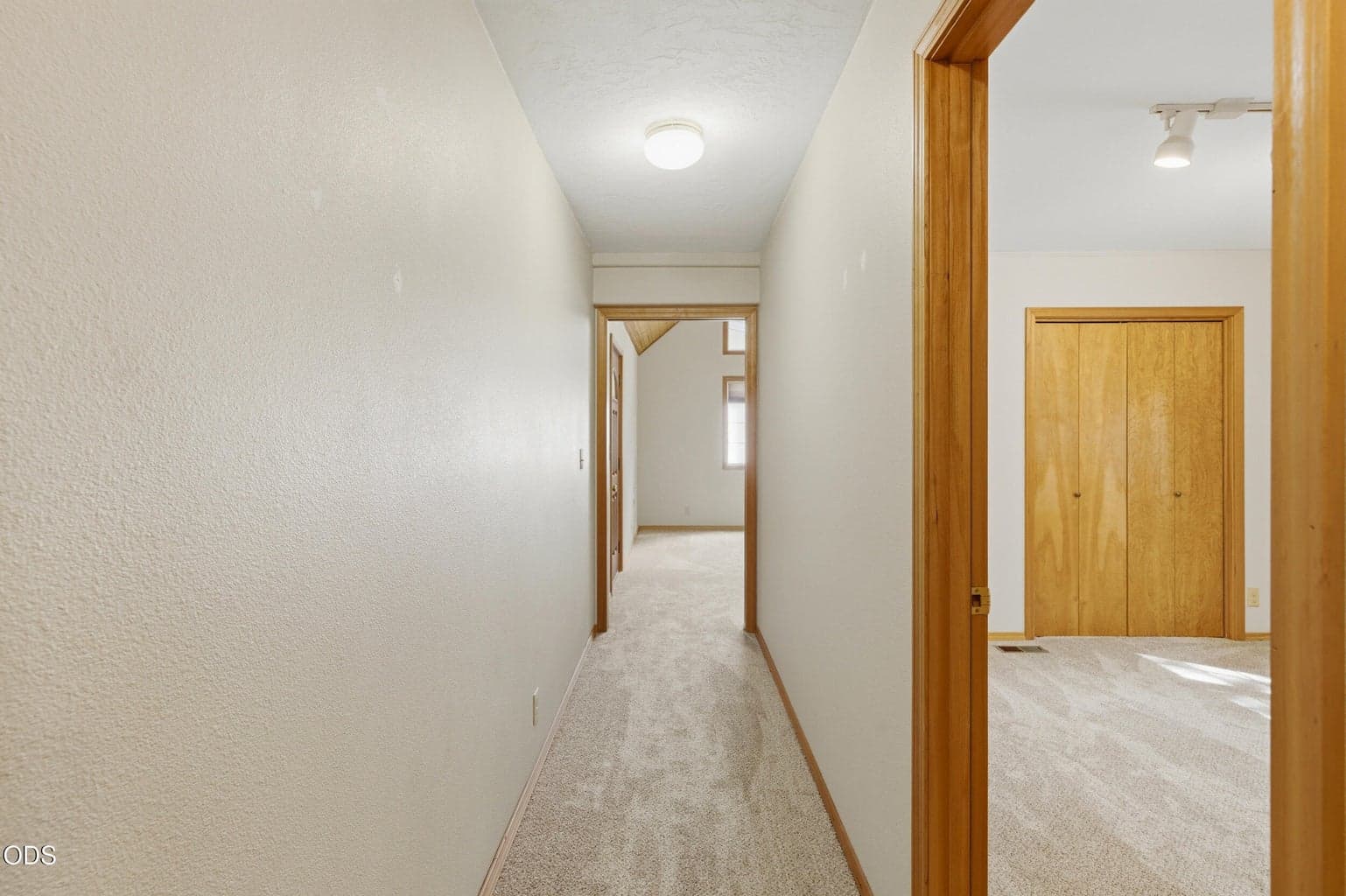 Hallway to Den, Guest Bedroom 1 on Right