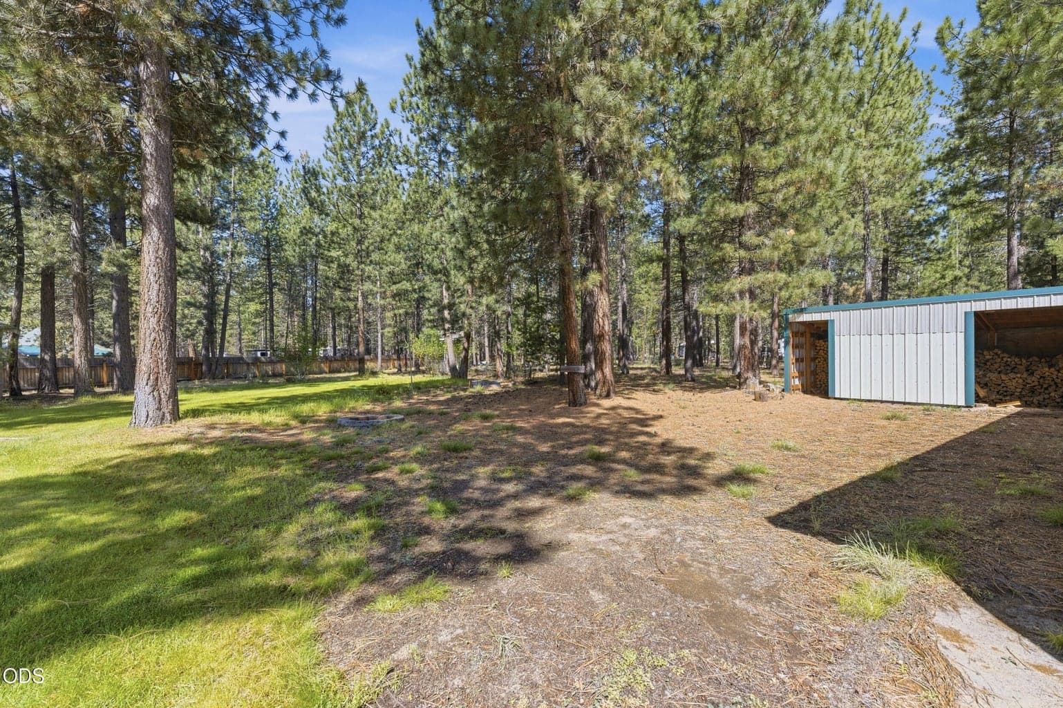 Back Yard with Wood Storage