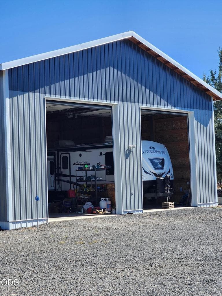 Shop is 38 x 36 with a 16Ft ceiling and 14Ft overhead doors