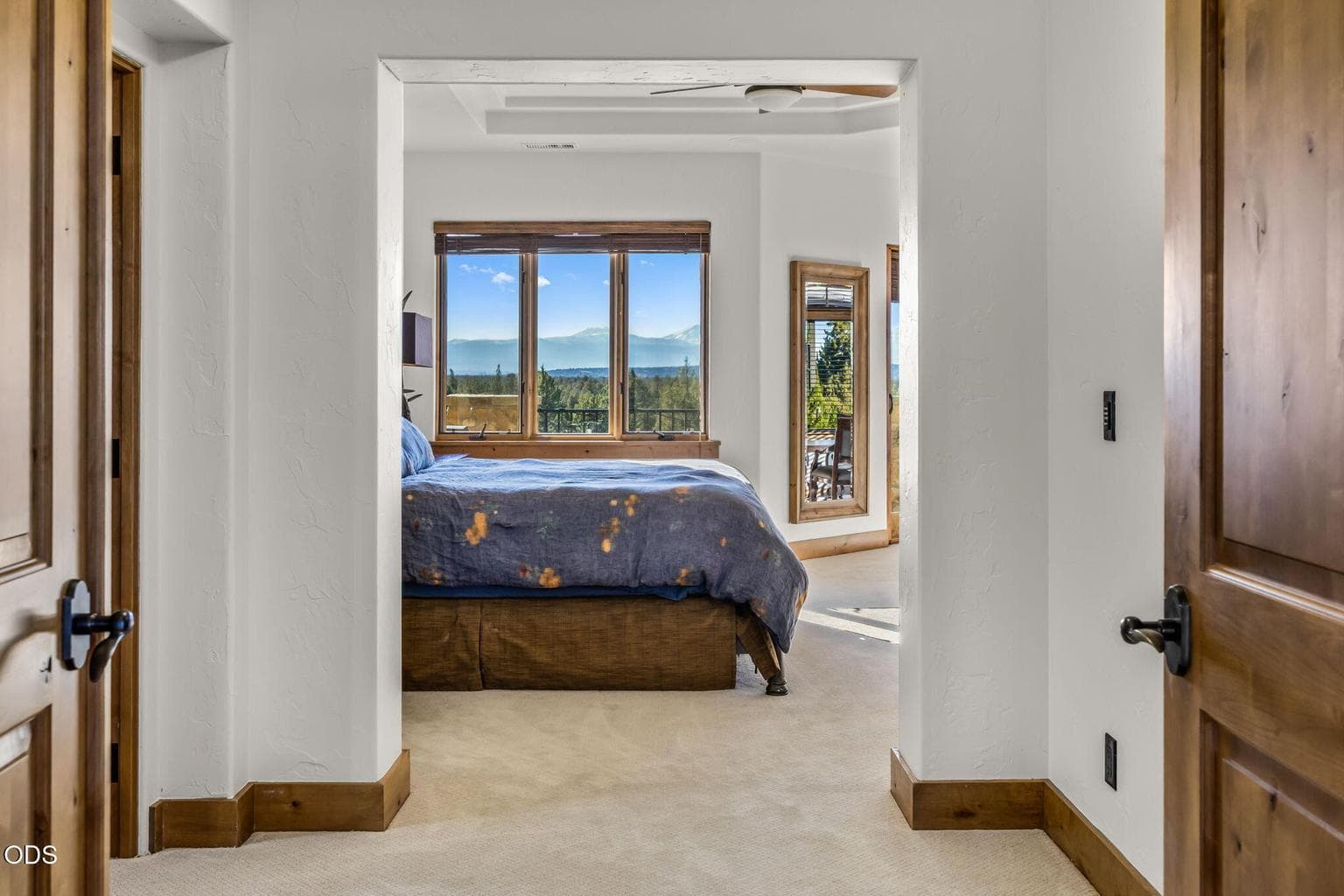 Double door private entry to primary en suite. Amazing views to the entire Cascade mountain range from the wrap around windows.