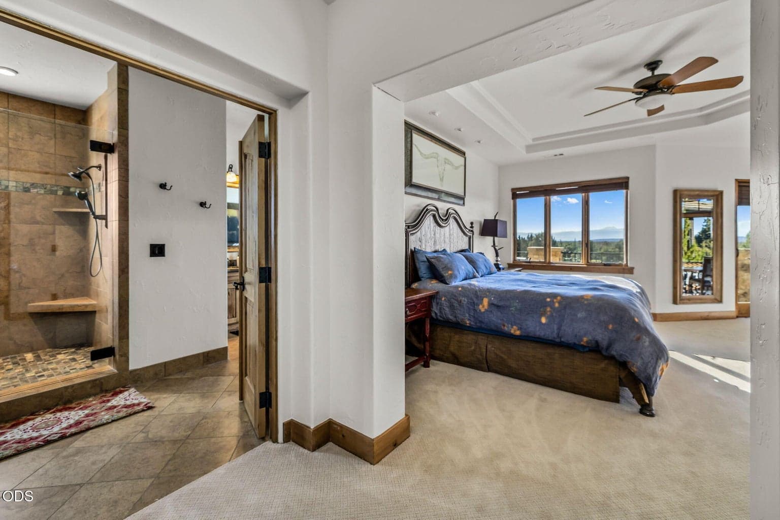 Large Spa inspired bathroom adjoins the the primary