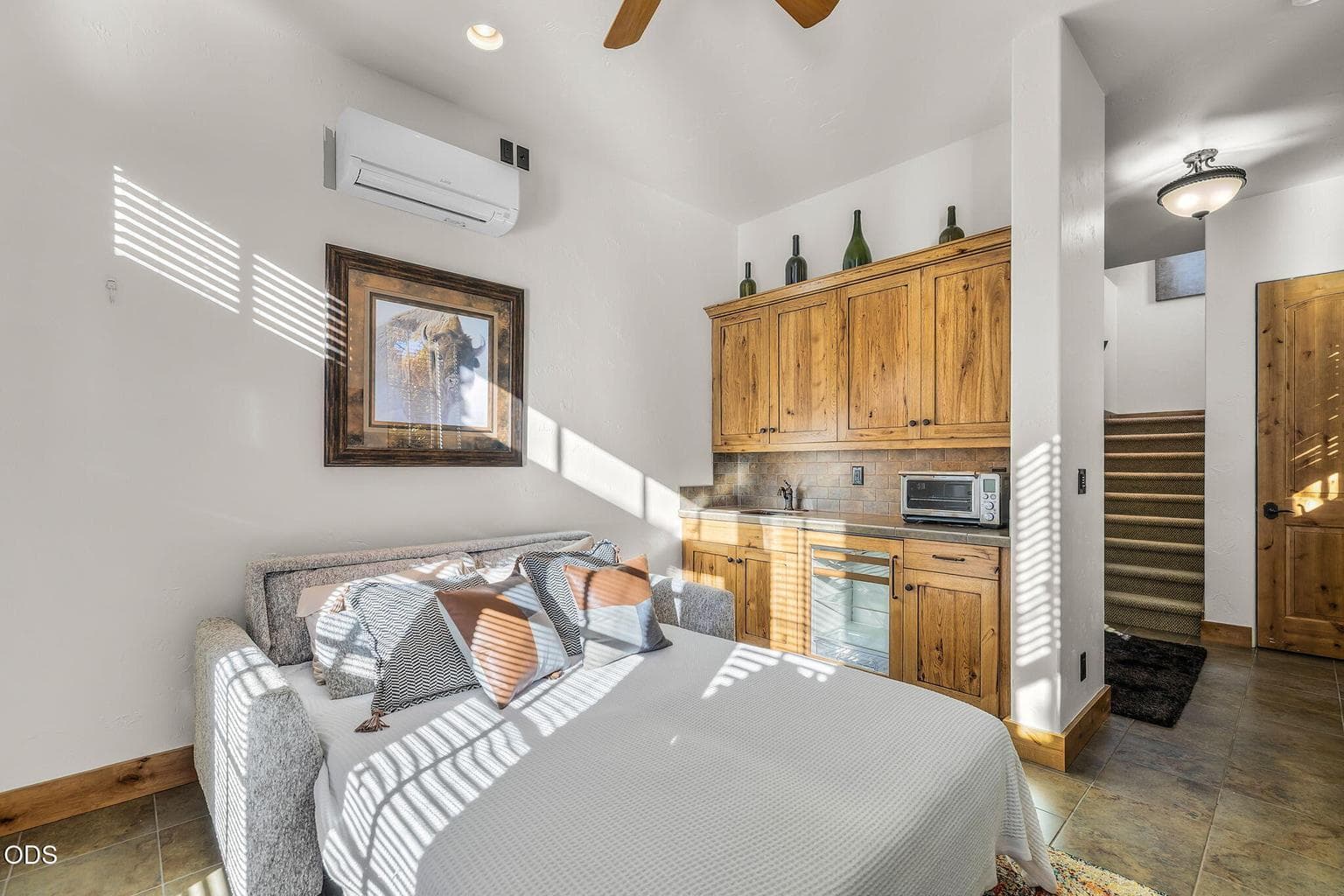 Main level Casita bedroom with mini kitchen