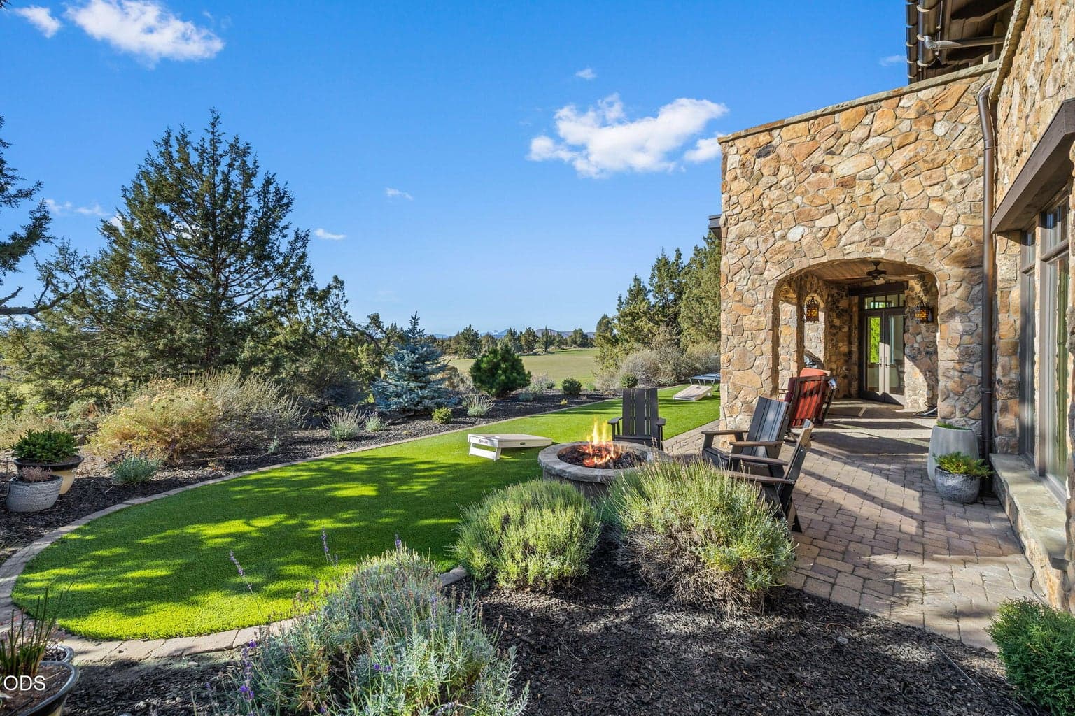 West facing patio and artificial turf play area