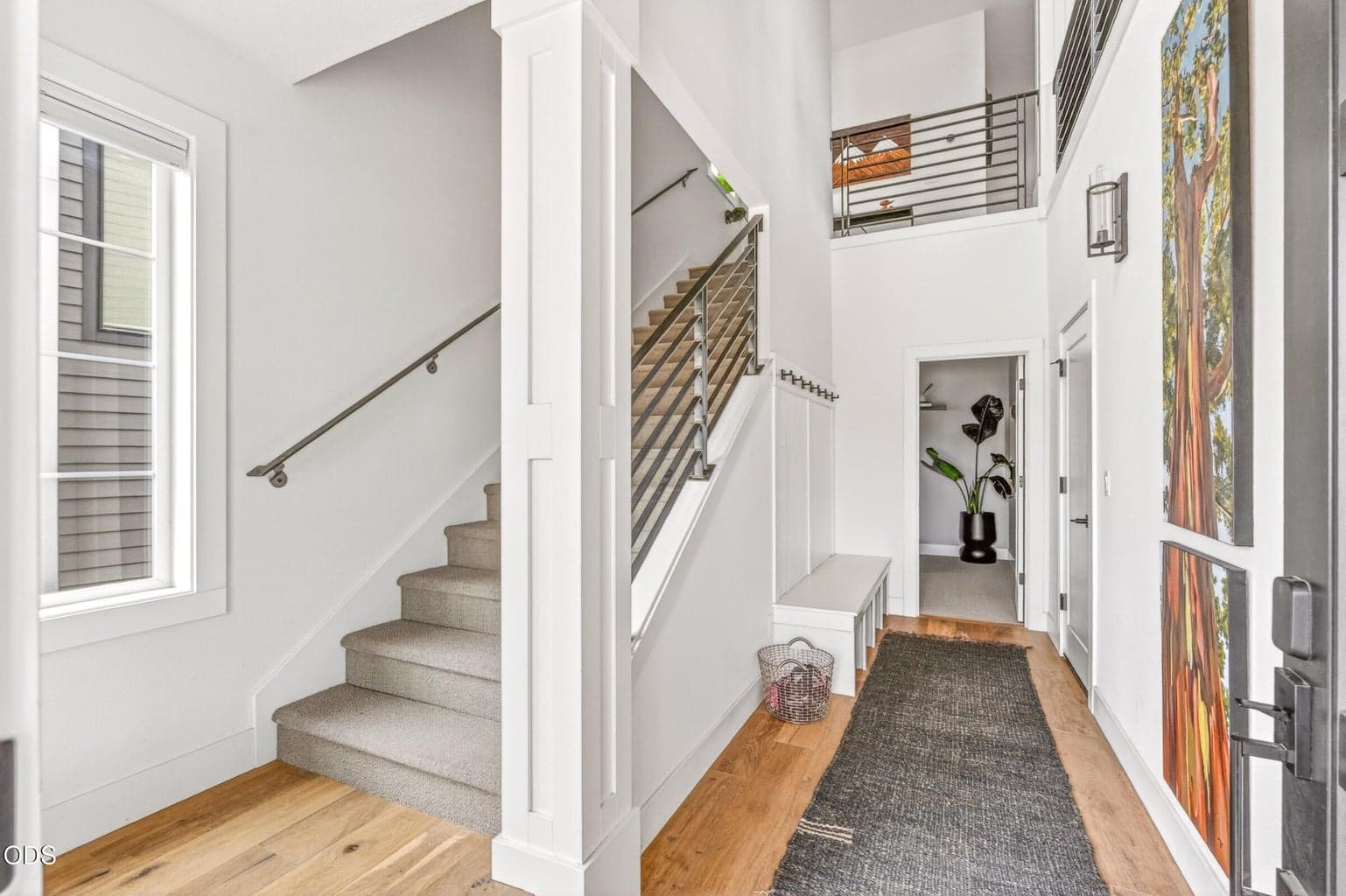 Ground floor that leads to the garage and bedroom #2 or office