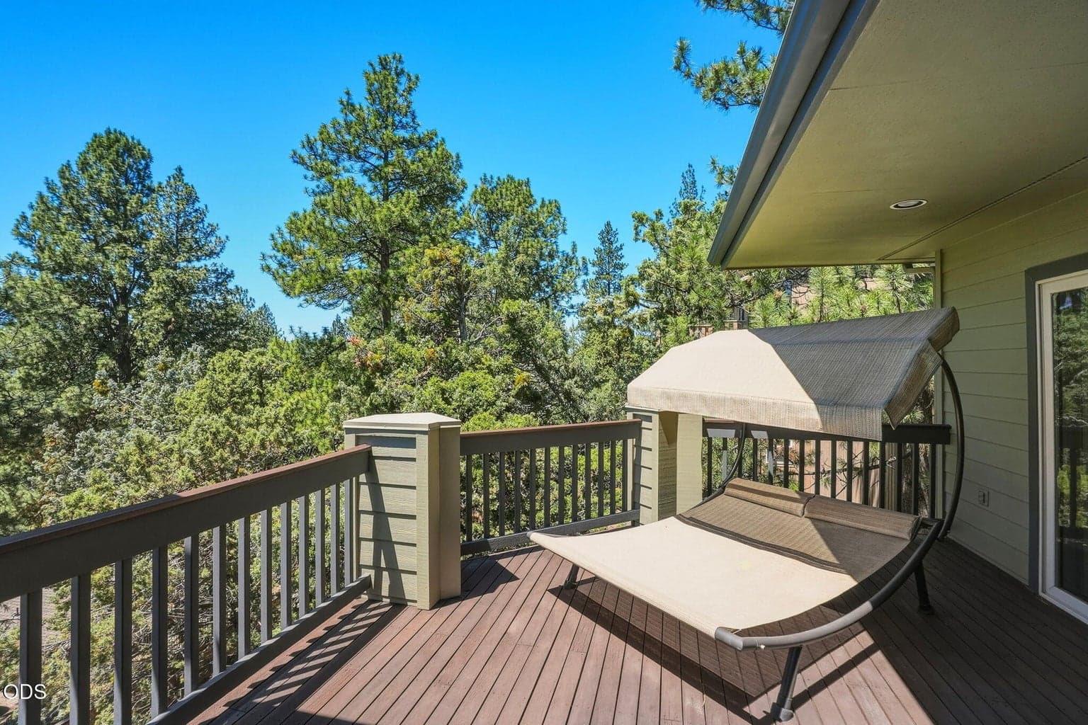The Primary Suite enjoys direct access to a private deck, thoughtfully positioned to maximize outdoor enjoyment.
