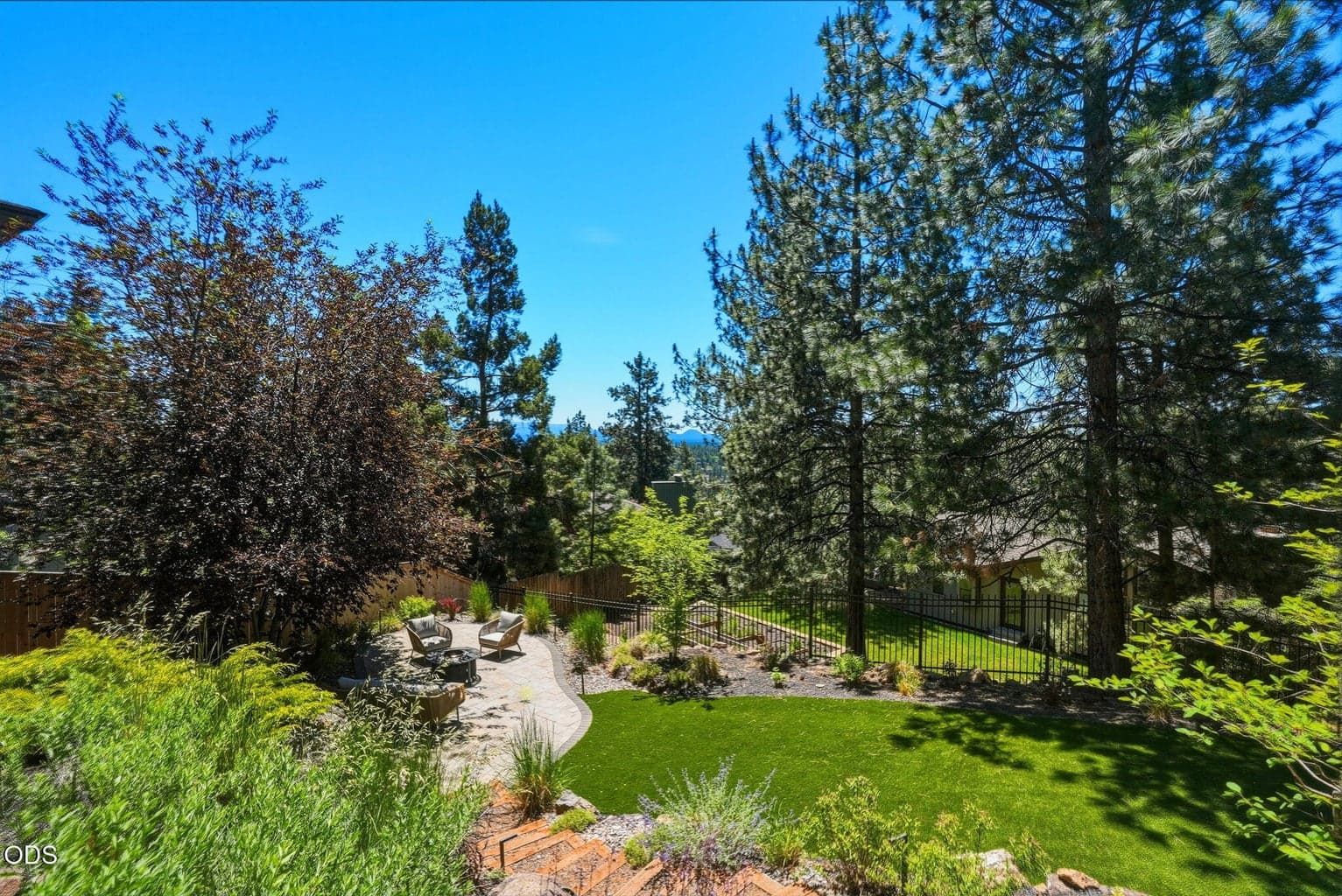 Professionally landscaped, designed for entertaining, privacy, low maintenance and serenity.