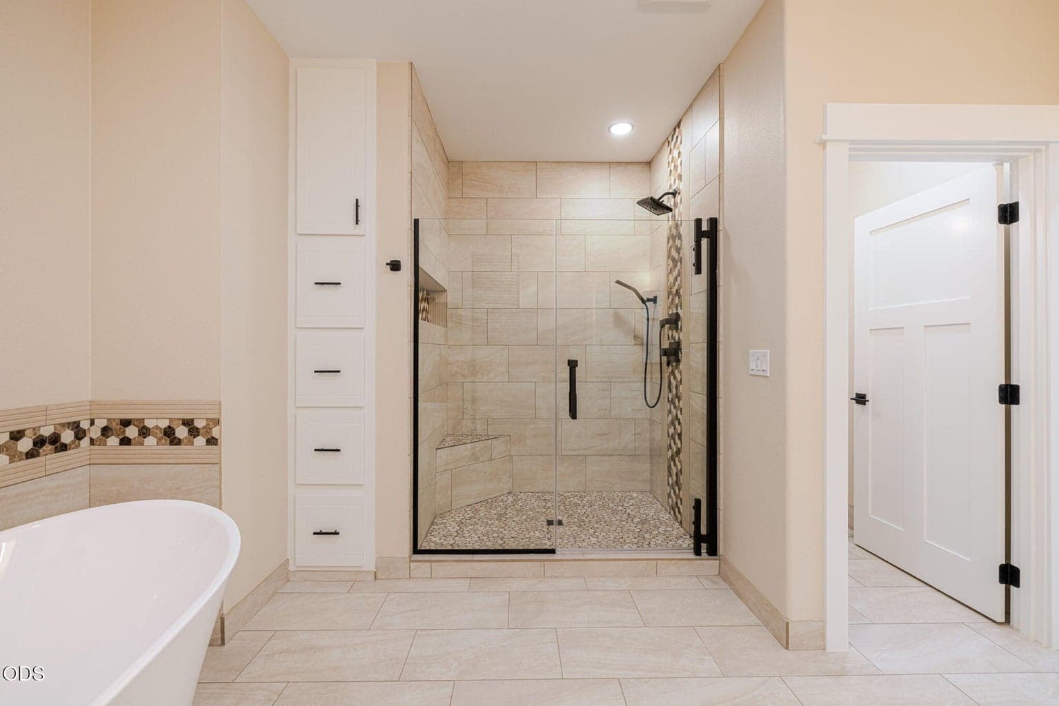 Newly Tiled Shower and Built-ins For Storage