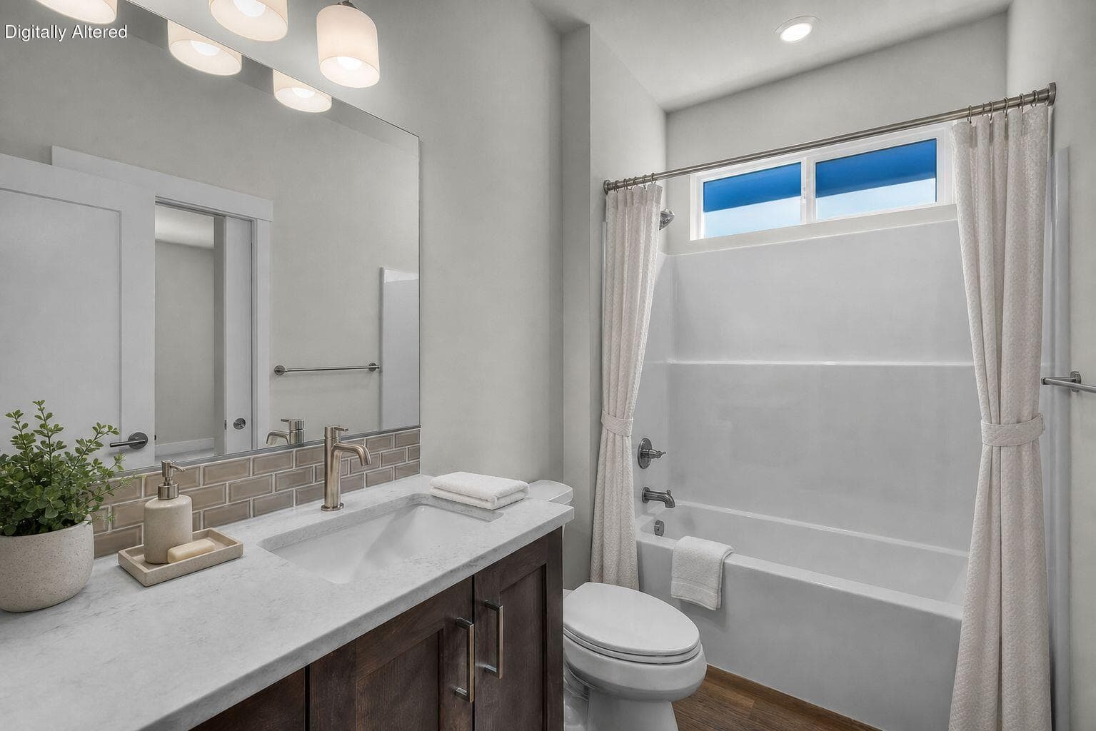 Hall Bath. Photo has been virtually staged.