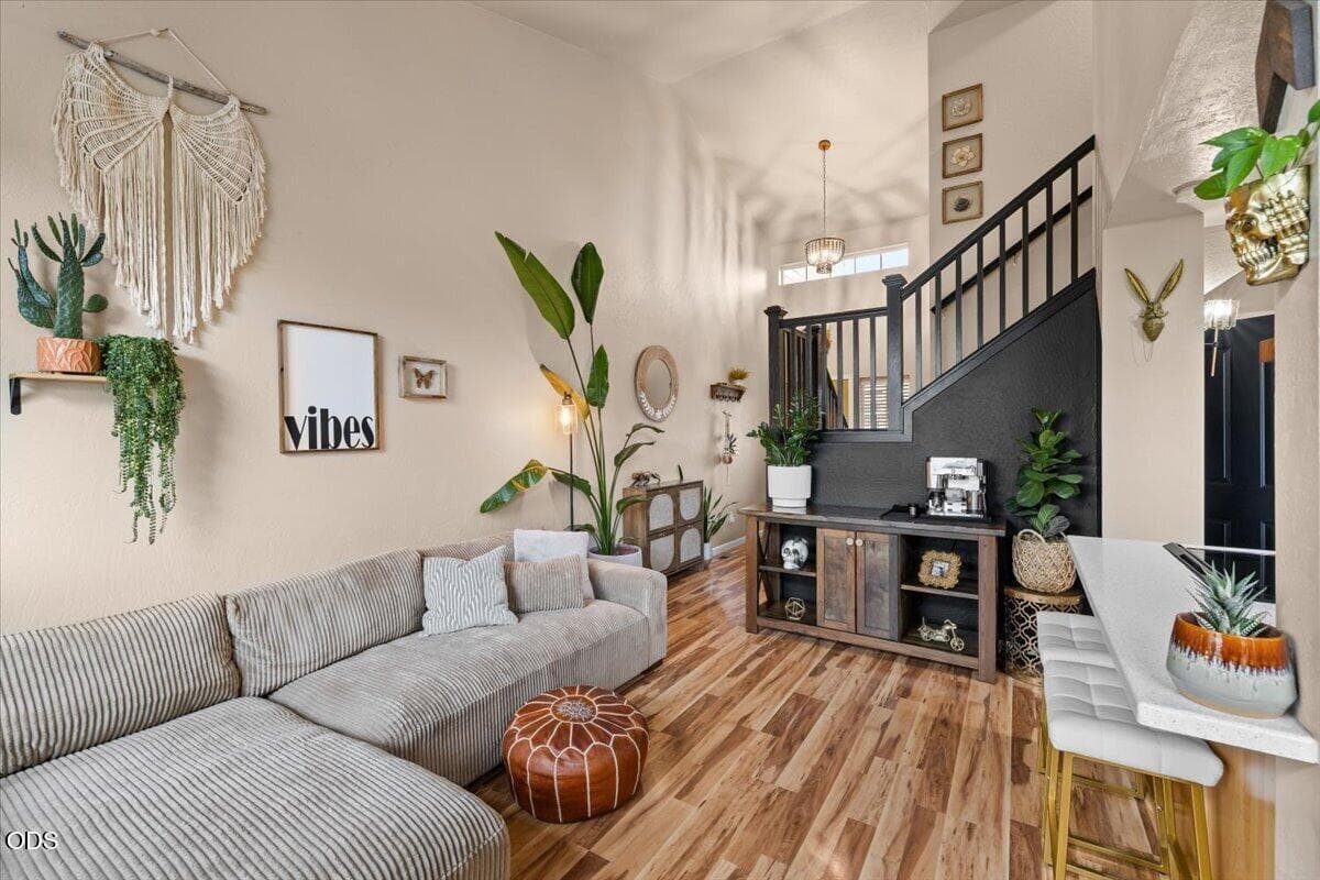 Living room with breakfast bar on right