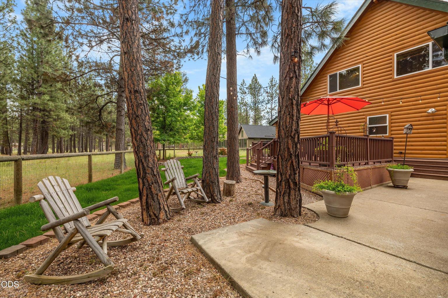 Looking back toward the patio and rear deck from behind the garage.
