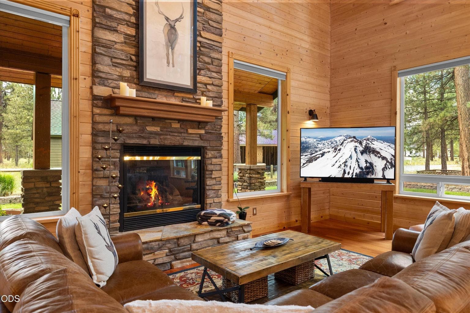 Gorgeous stone fireplace and hearth welcome you to linger a while.
