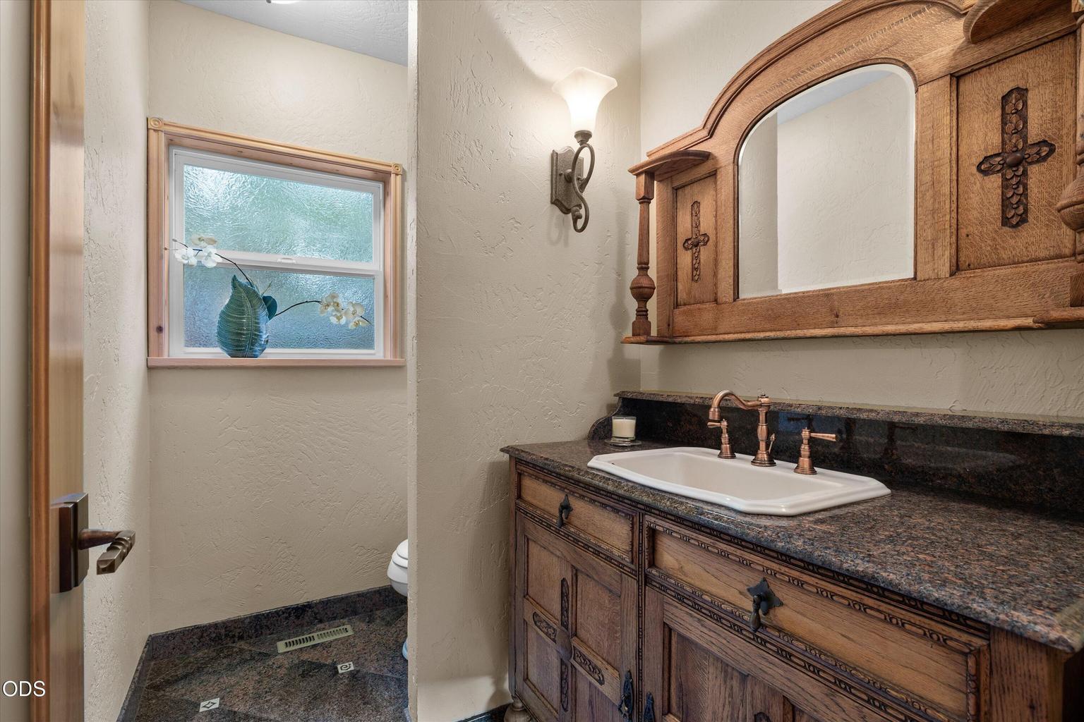 Half bath is conveniently located on the main level.