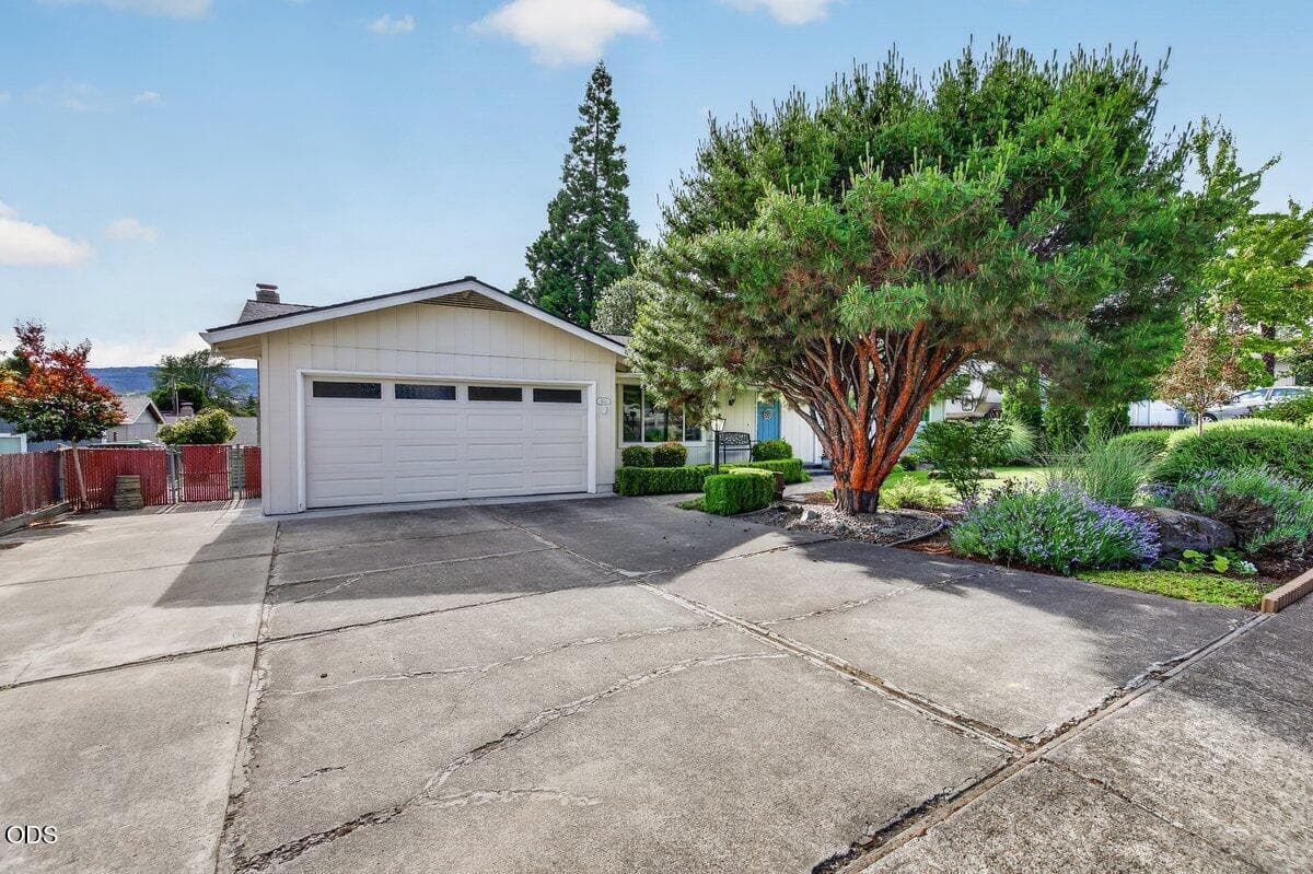 RV area beside 2-car garage