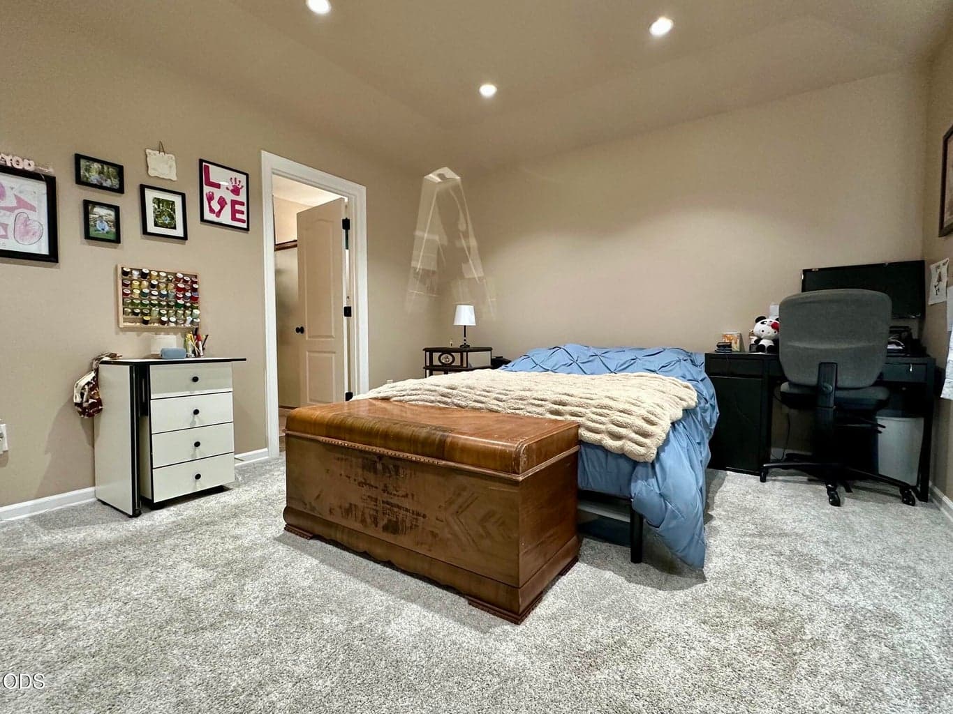 Spacious Primary Bedroom with attached bathroom and vaulted ceiling.