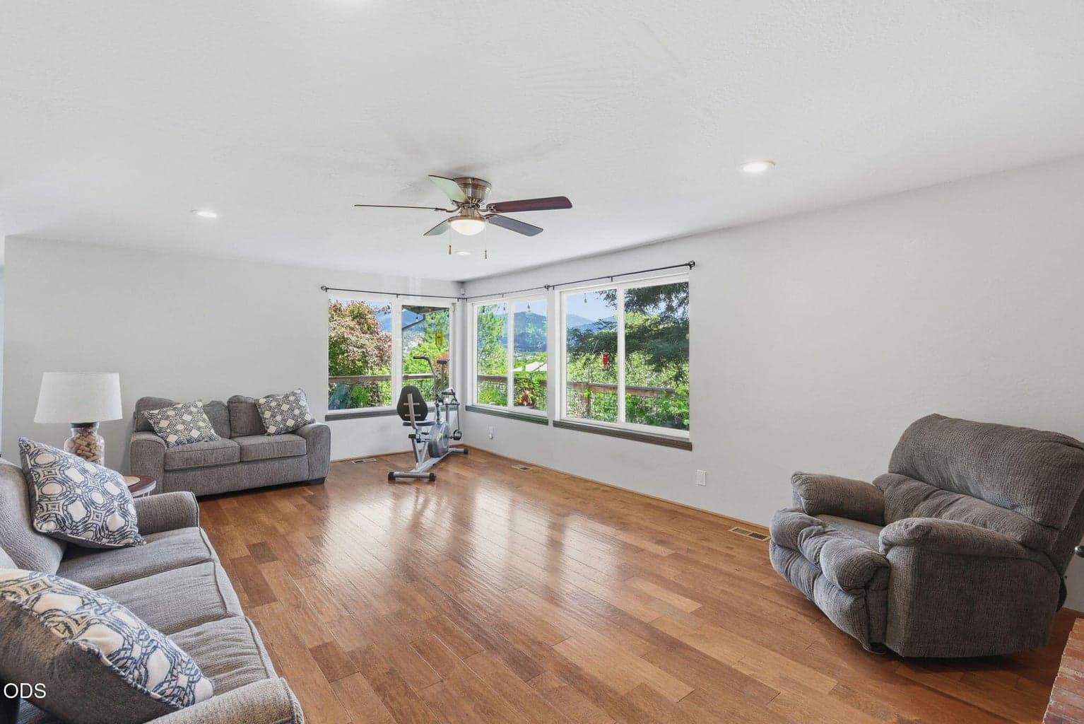 Primary living room with Beautiful views of the valley and so much natural lighting.