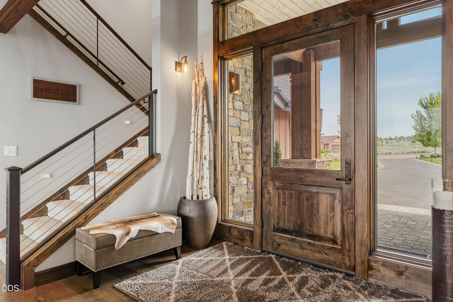 Step into a welcoming foyer to a thoughtfully designed layout - open stairs to a landing above, great room in front, and halls to each side to other rooms
