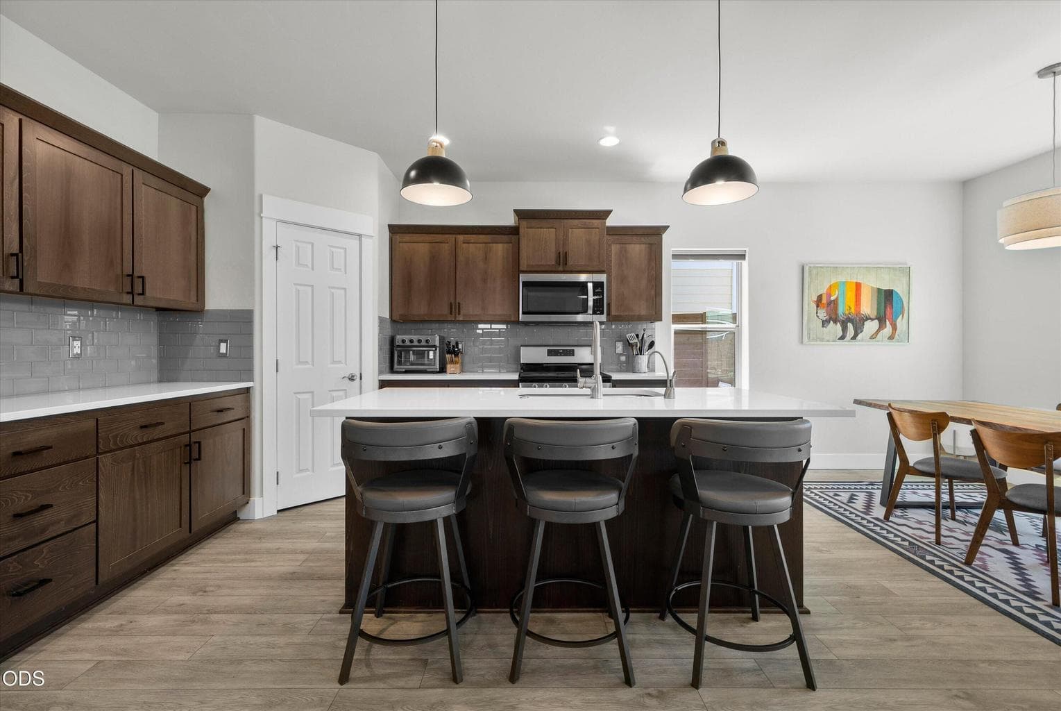 Island with sink and eating bar