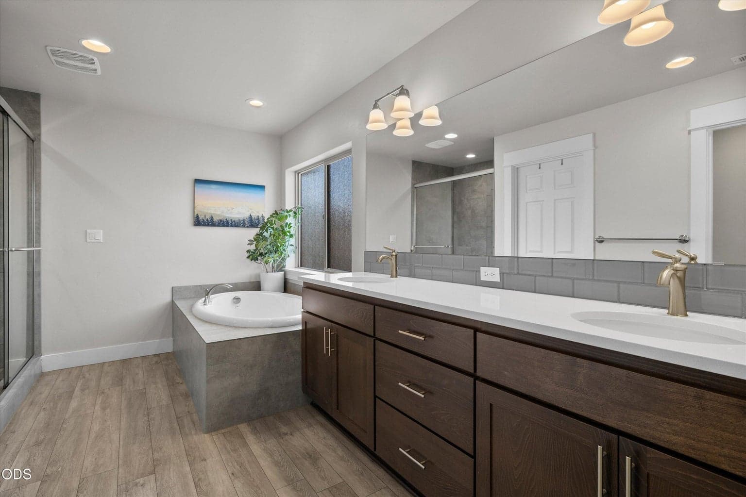 LVP flooring in primary bathroom
