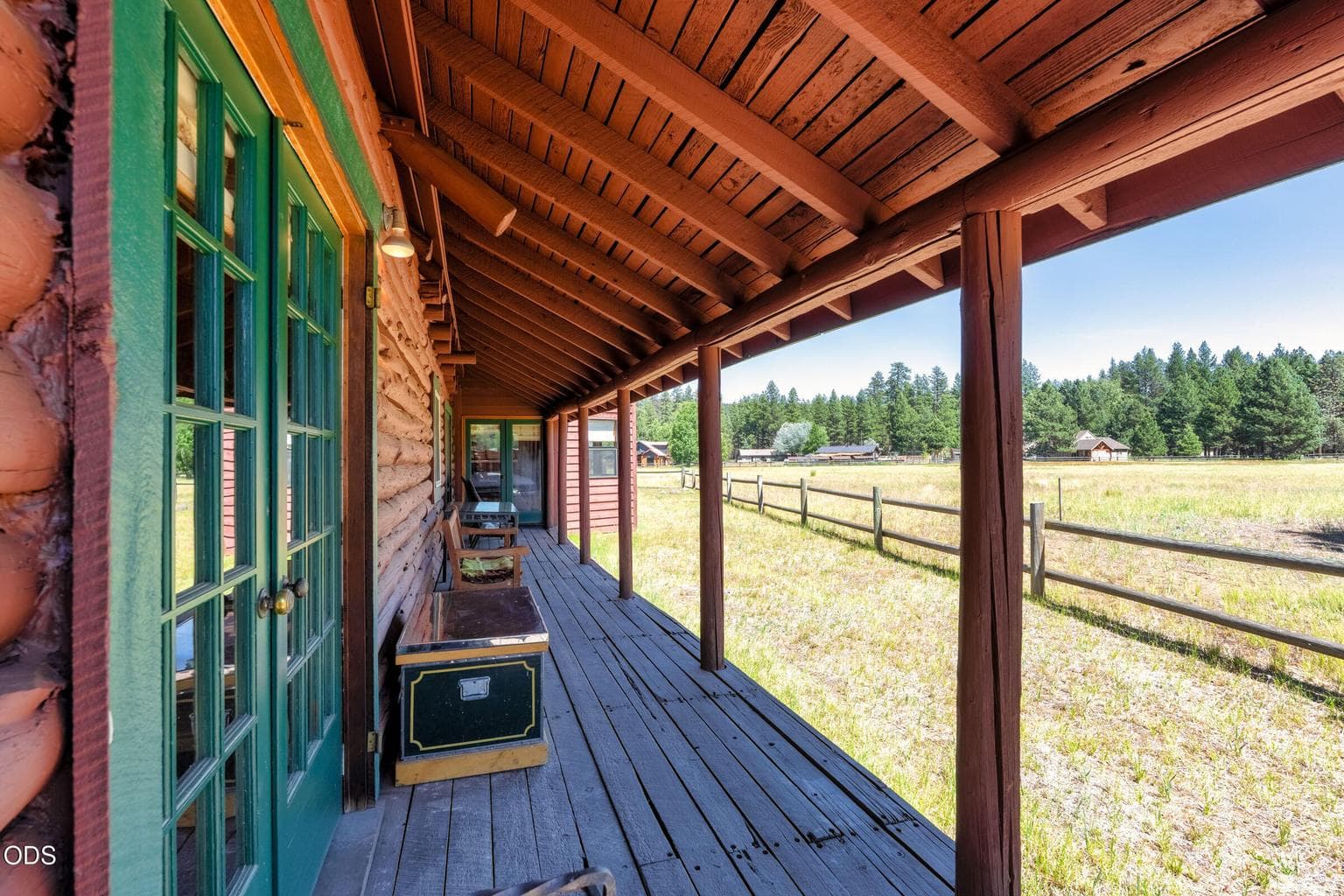 covered rear porch, looking out to meadow