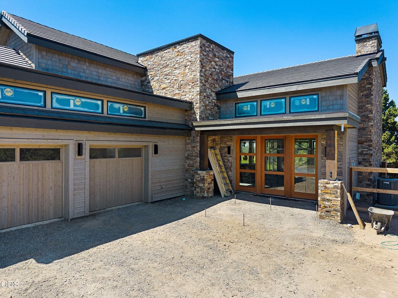 Front entry and 3 car garage