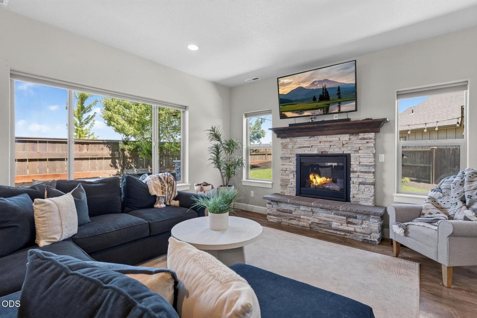 TV is hardwired & mounted and is included with home