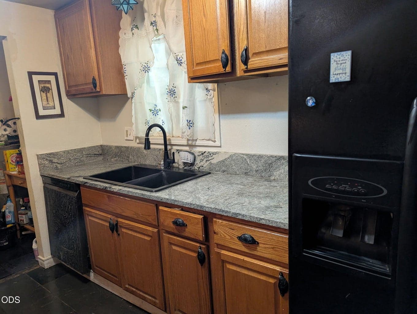 kitchen showing the new sink and fixtures and counter tops