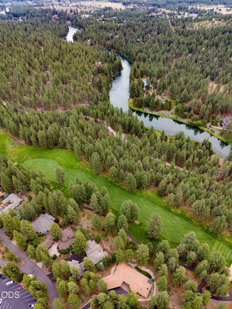 Home with the view of the Deschutes River and forest just byond the 12th fairway and home second roof from the right