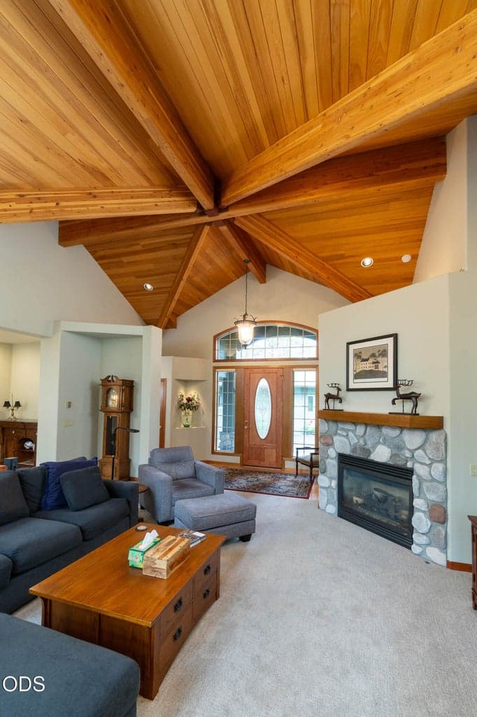 Amazing wood beam ceiling covering the living room