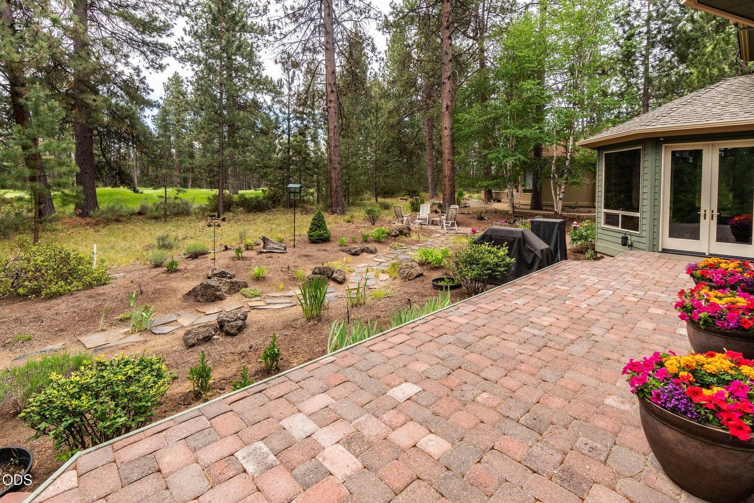 Rear deck facing east and to the south with the 12th green in the back