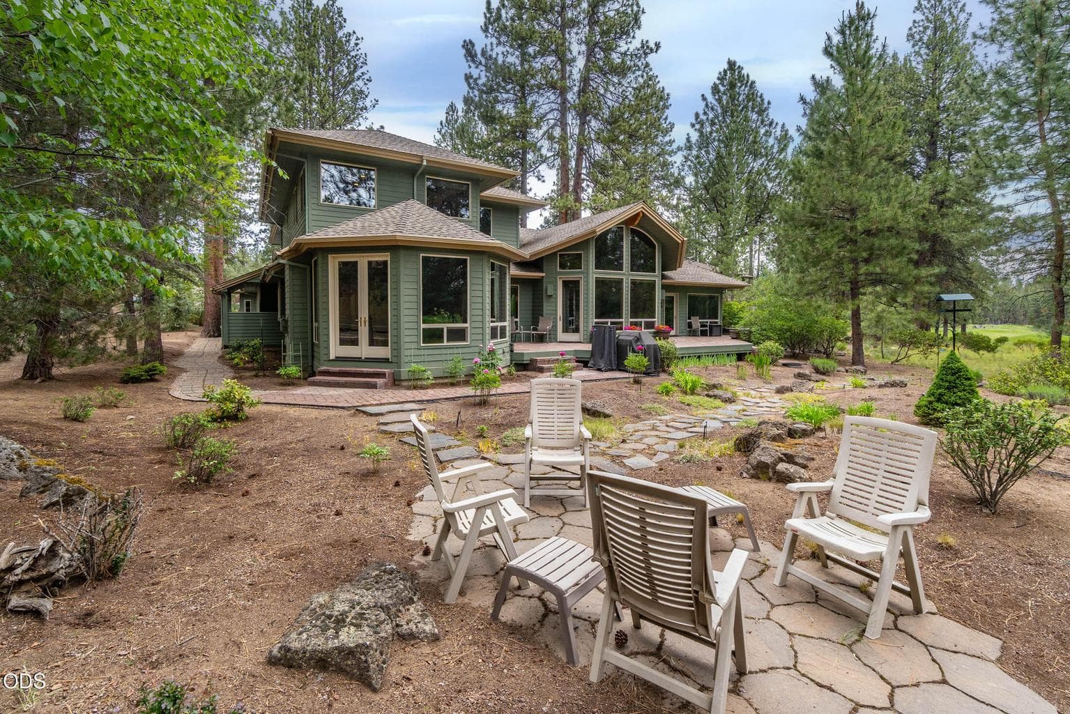 Sunroom is on the left and living room in the center section