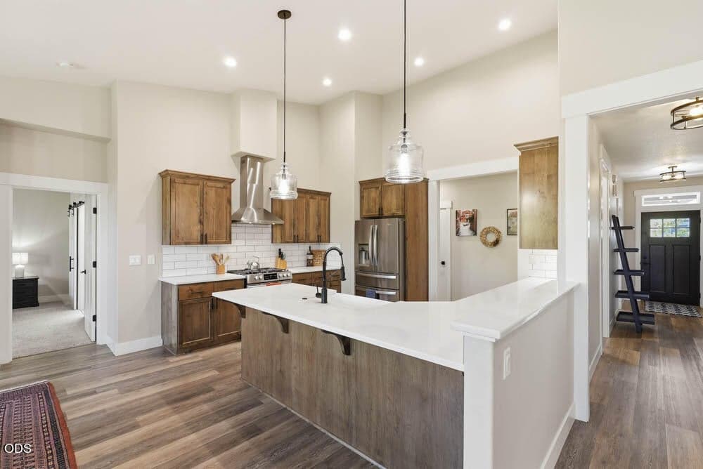 Large gourmet kitchen with stainless appliances