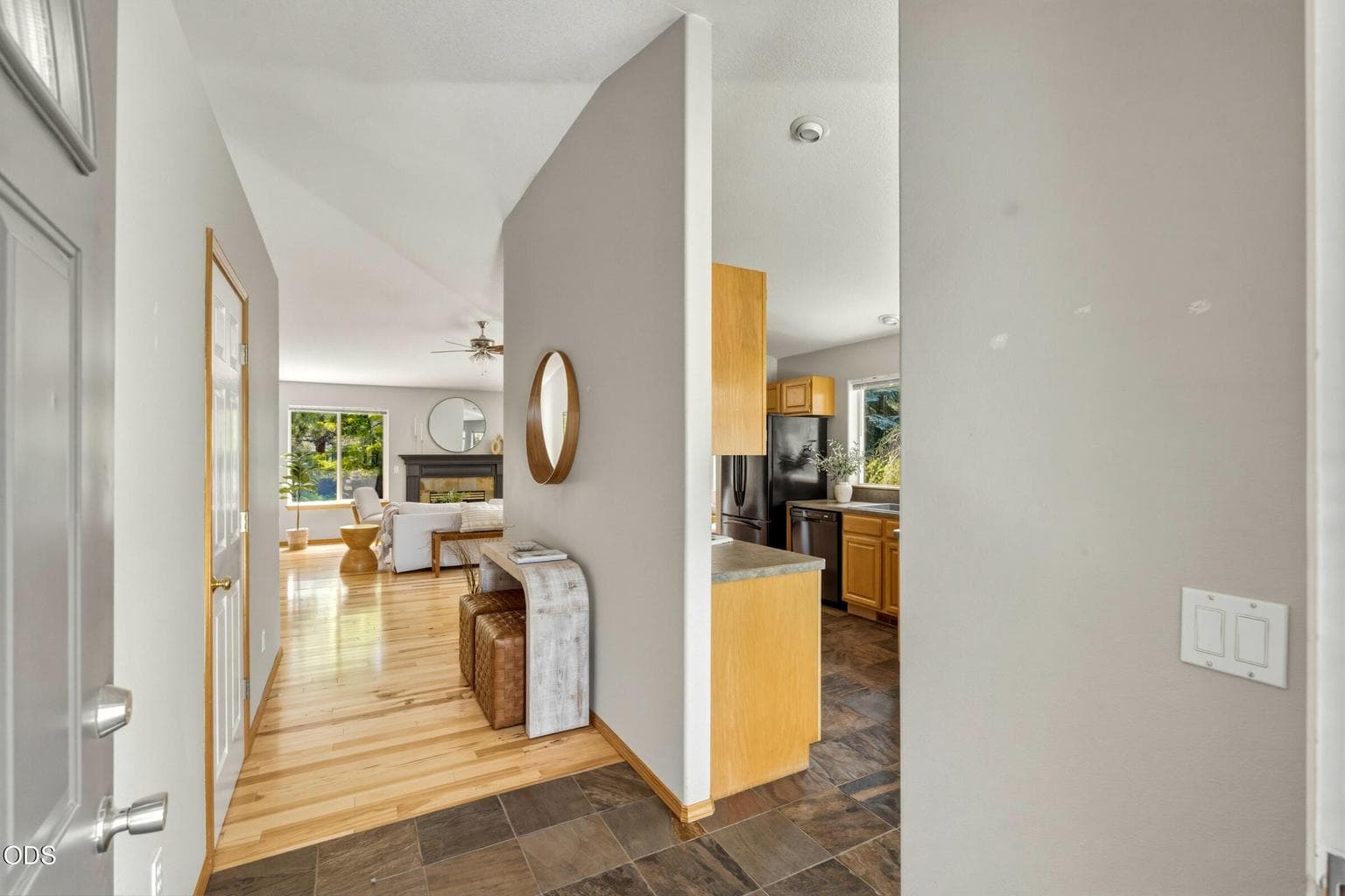 Entry that leads to the family room, kitchen and laundry room