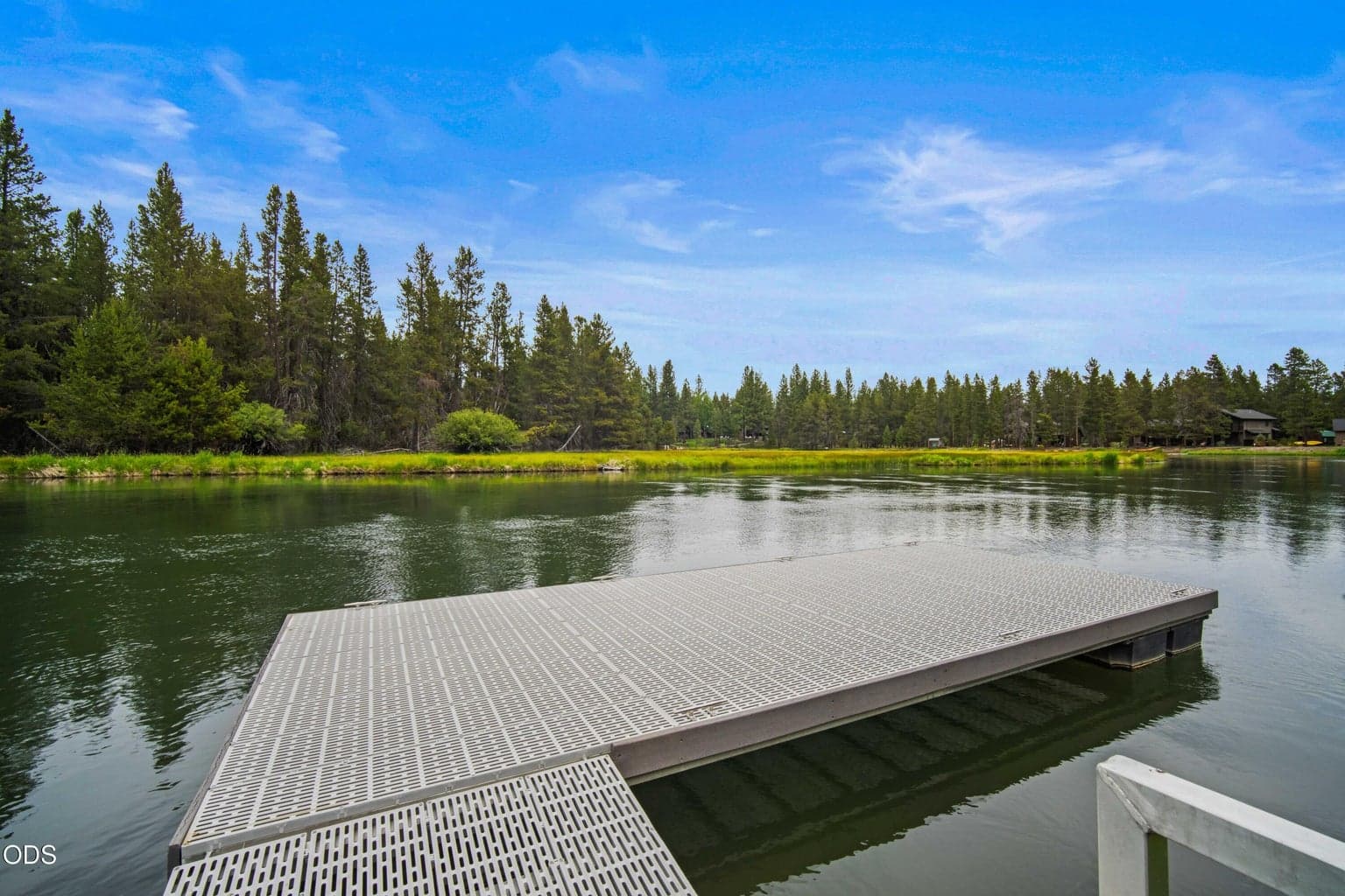 The shared dock provides direct access to the Big Deschutes River for paddling, fishing, floating, or simply enjoying the water.