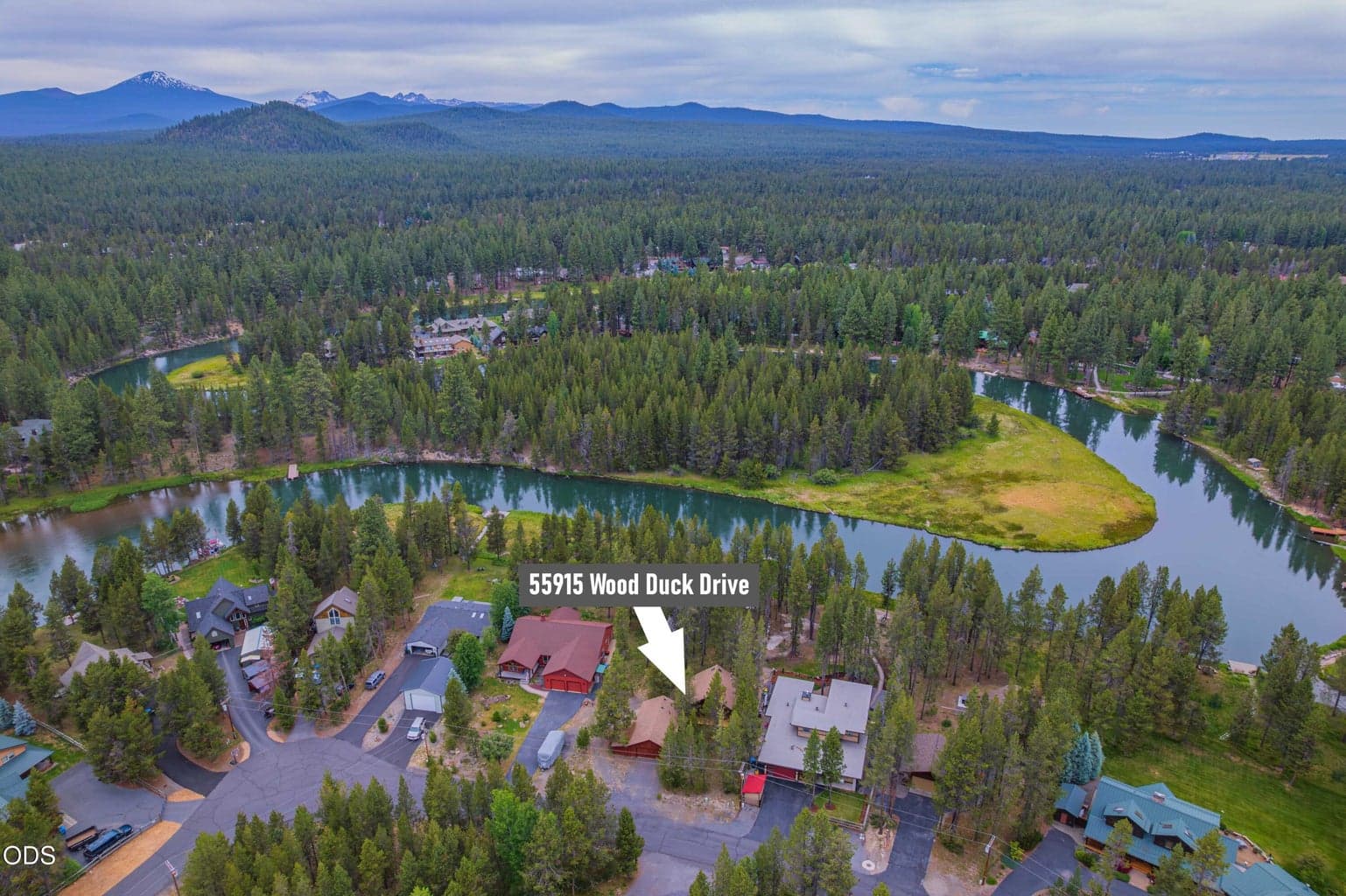 The wide aerial shows the property within Oregon Water Wonderland 2, surrounded by the Big Deschutes River corridor, forest, and nearby recreation.