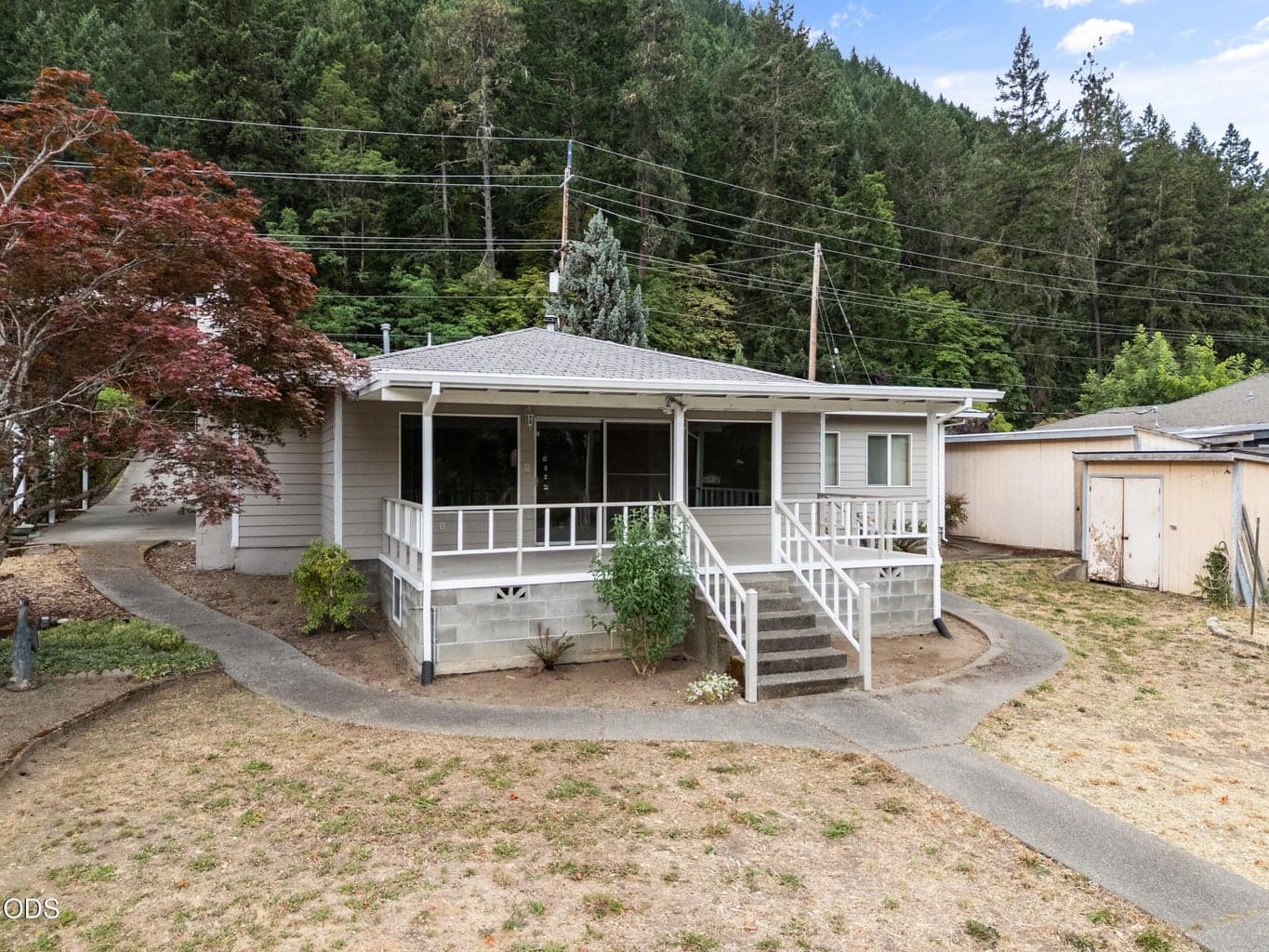 Rear covered porch facing Rogue River