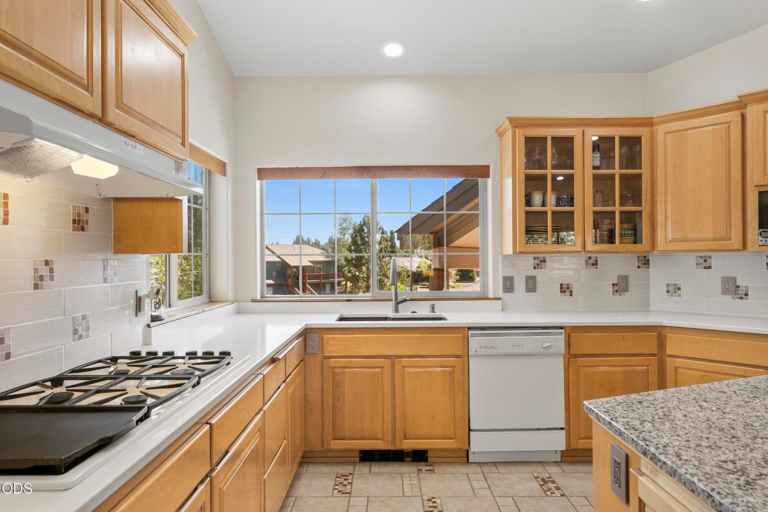 Quartz counters and granite island