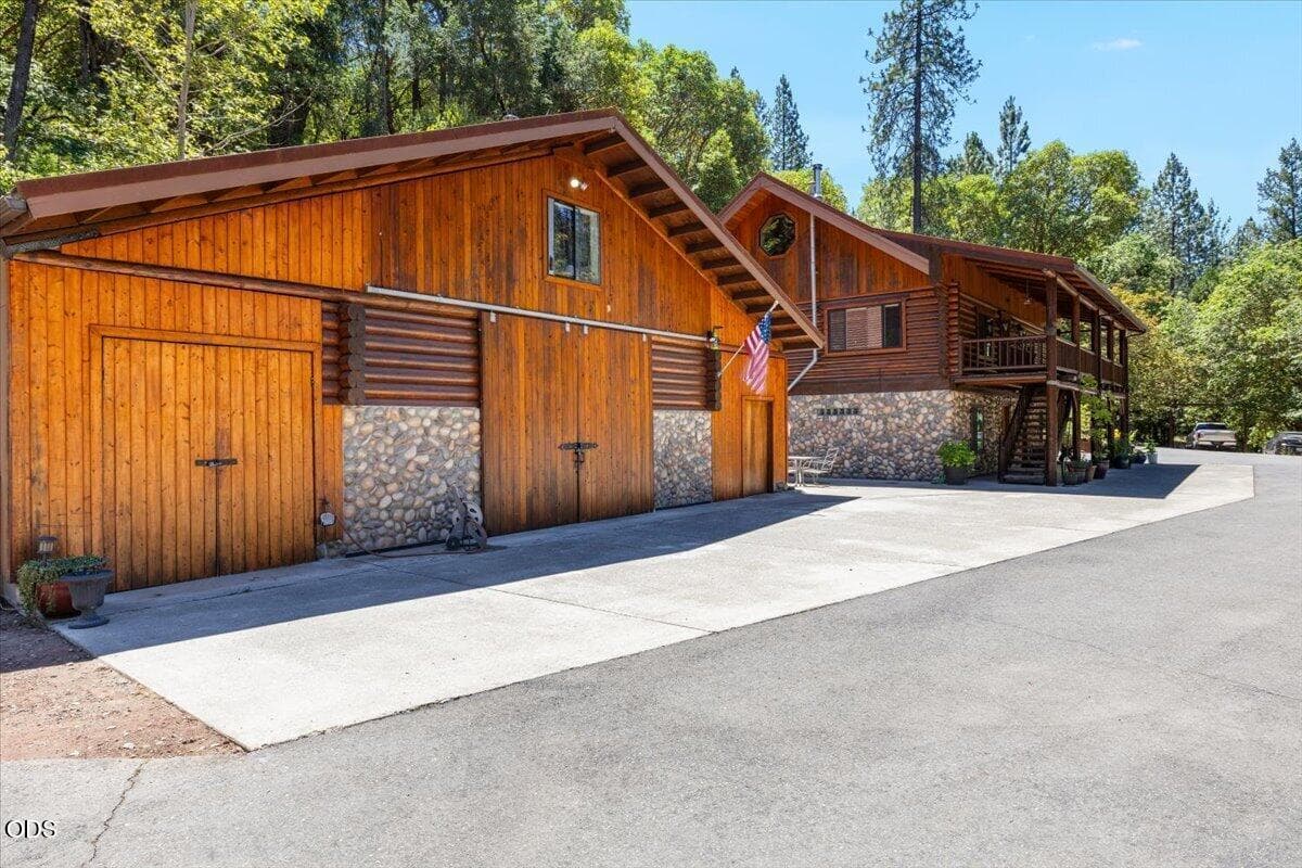 2 car garage with 2 separate shops/storage