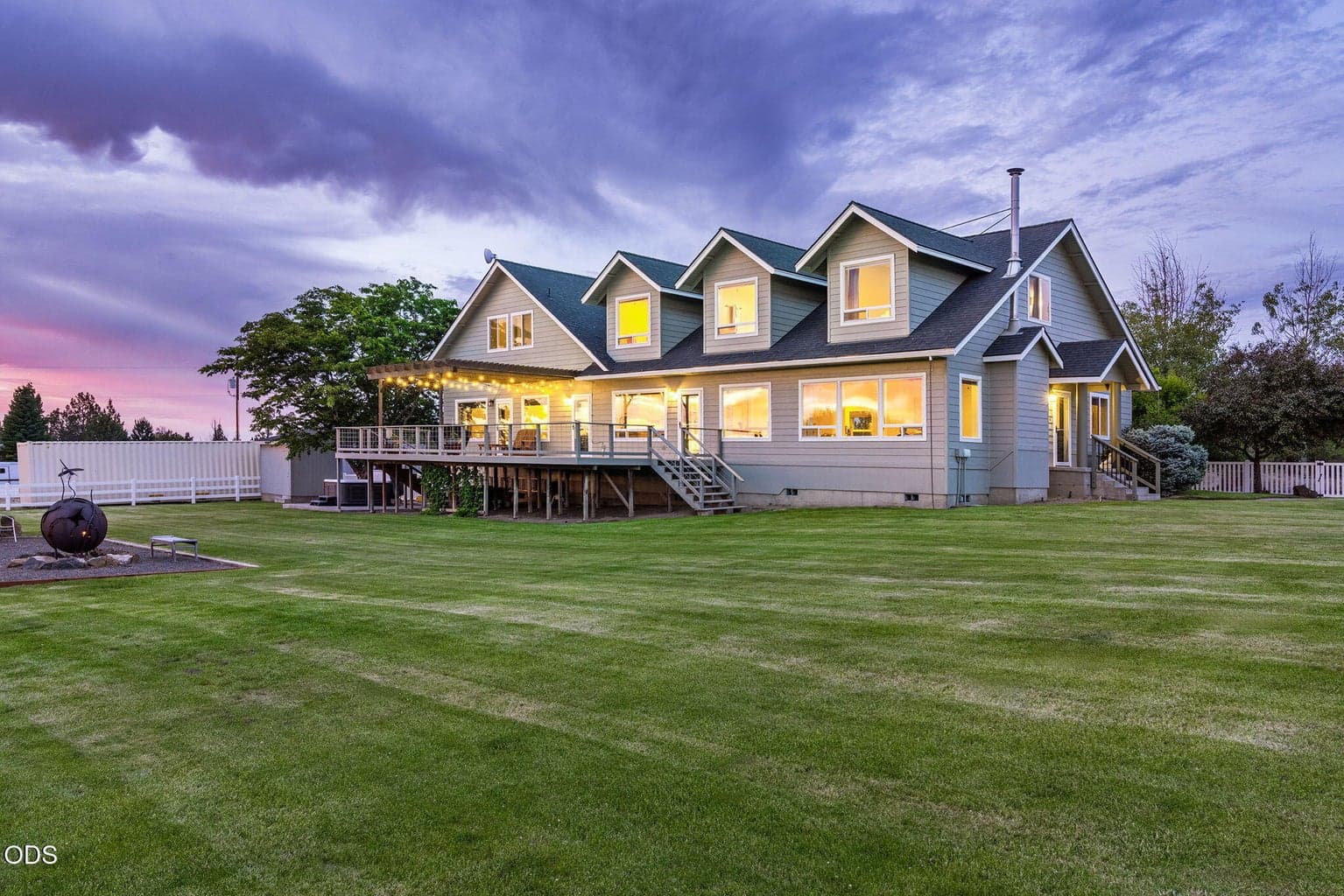 Stunning property on almost 5 acres with 2 acres of COID irrigation