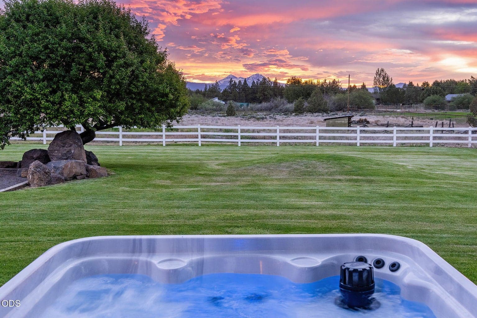 Relax in the hot tub while enjoying the sunset