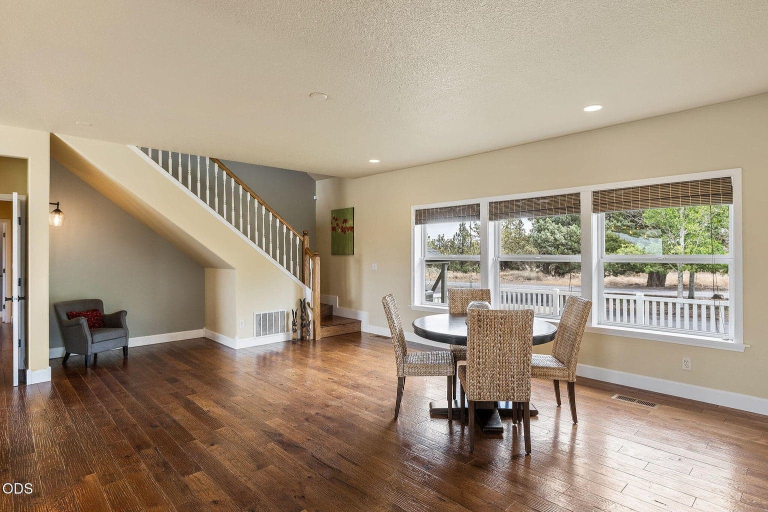 An inviting, open-concept dining room with plenty of room for a large dinner table, perfect for hosting family and friends