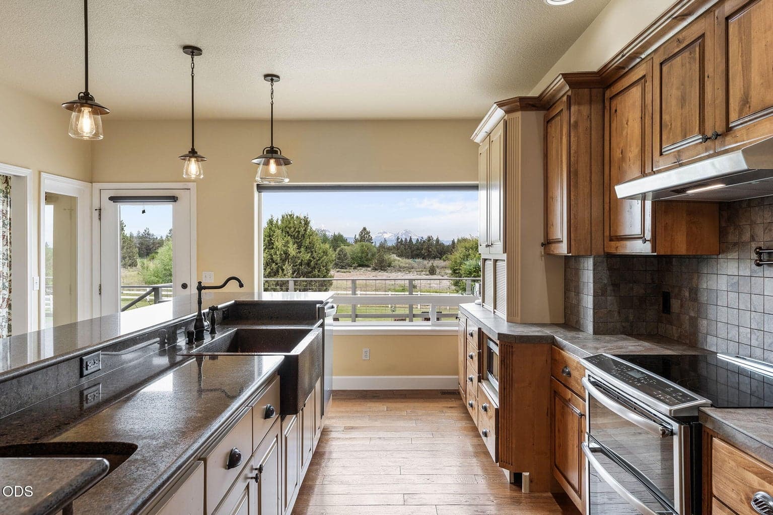 Well-appointed kitchen with beautiful Cascade Mountain Views
