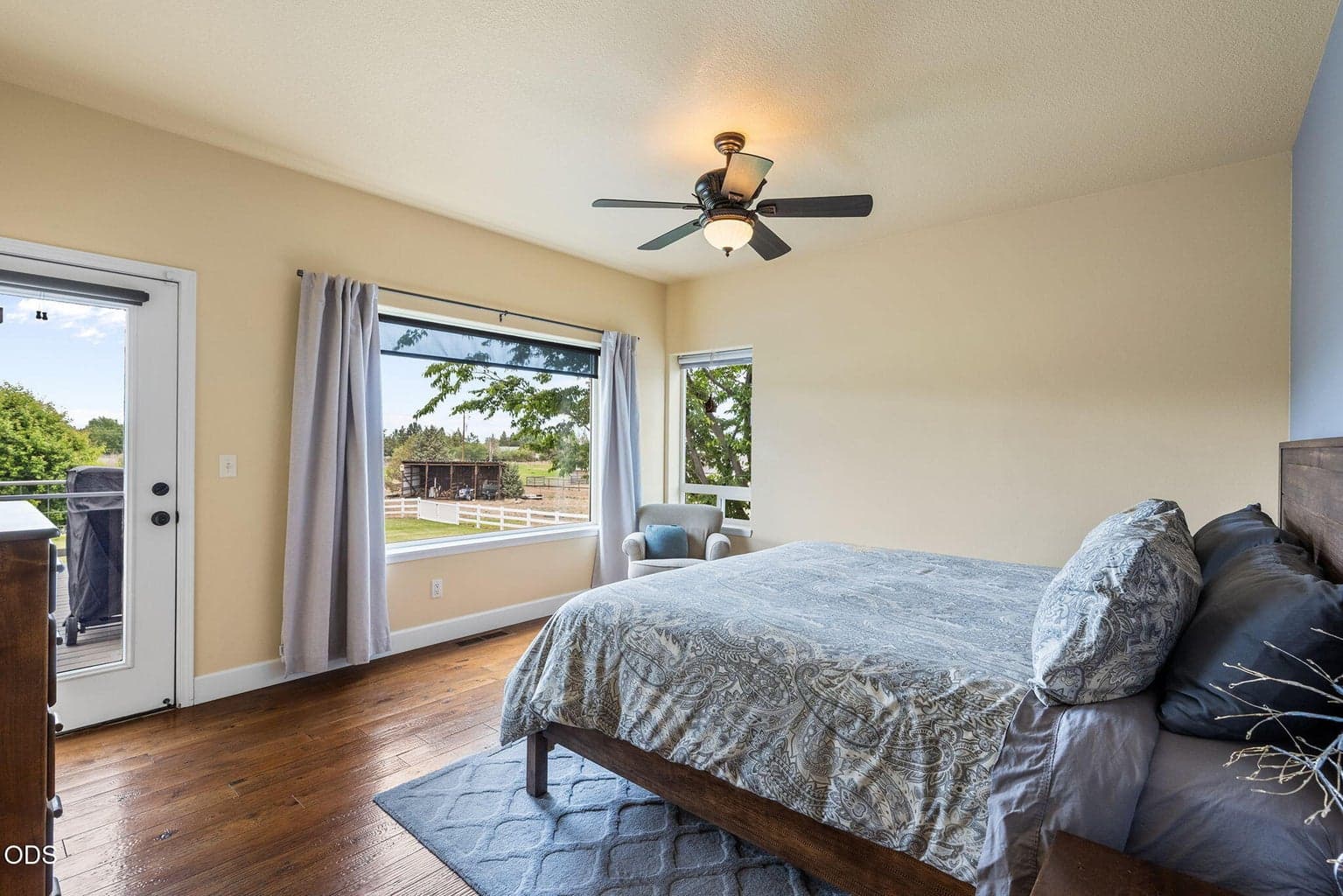 Main-floor primary suite with Cascade Mountain views