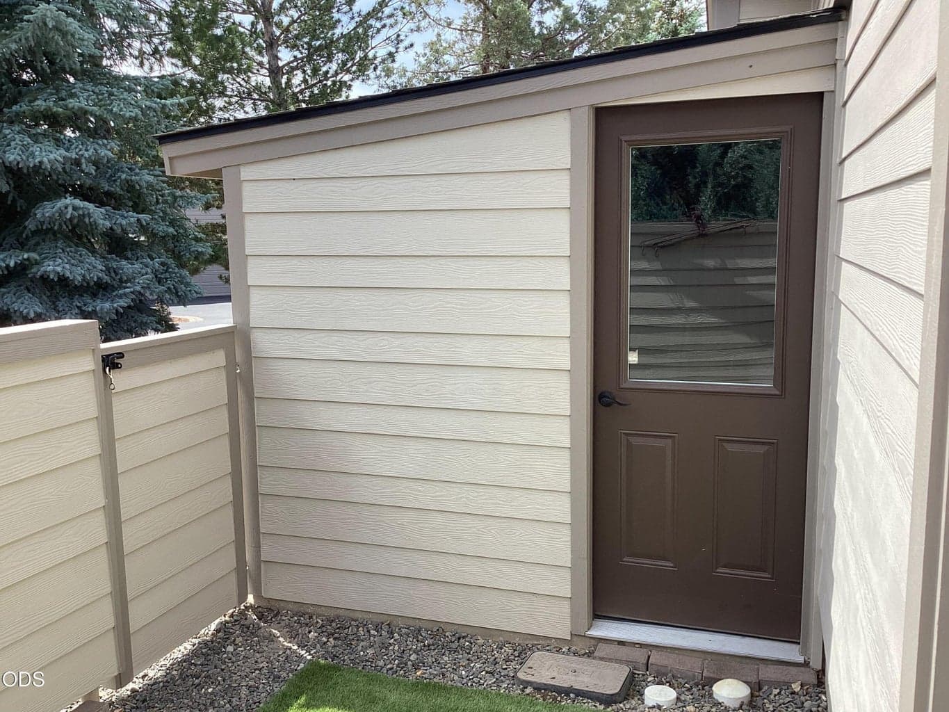 Covered storage on the side of the home