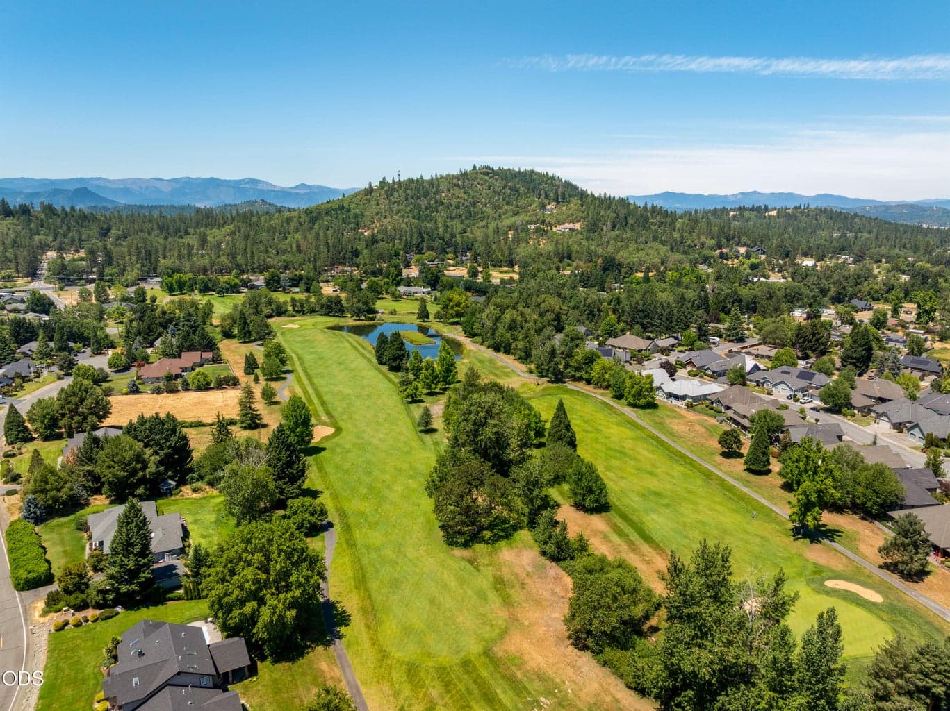 Short golf cart ride to golf course with golf cart path that goes under the road, to the club house.