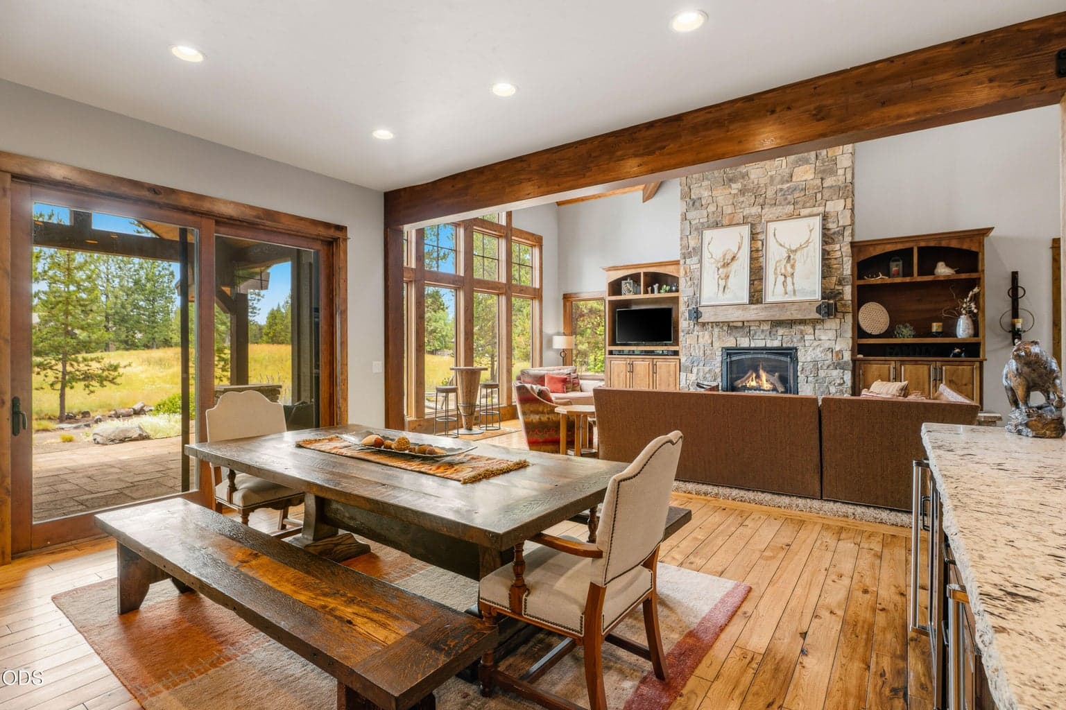 Enjoy seamless indoor-outdoor living with the dining area opening to the covered patio.