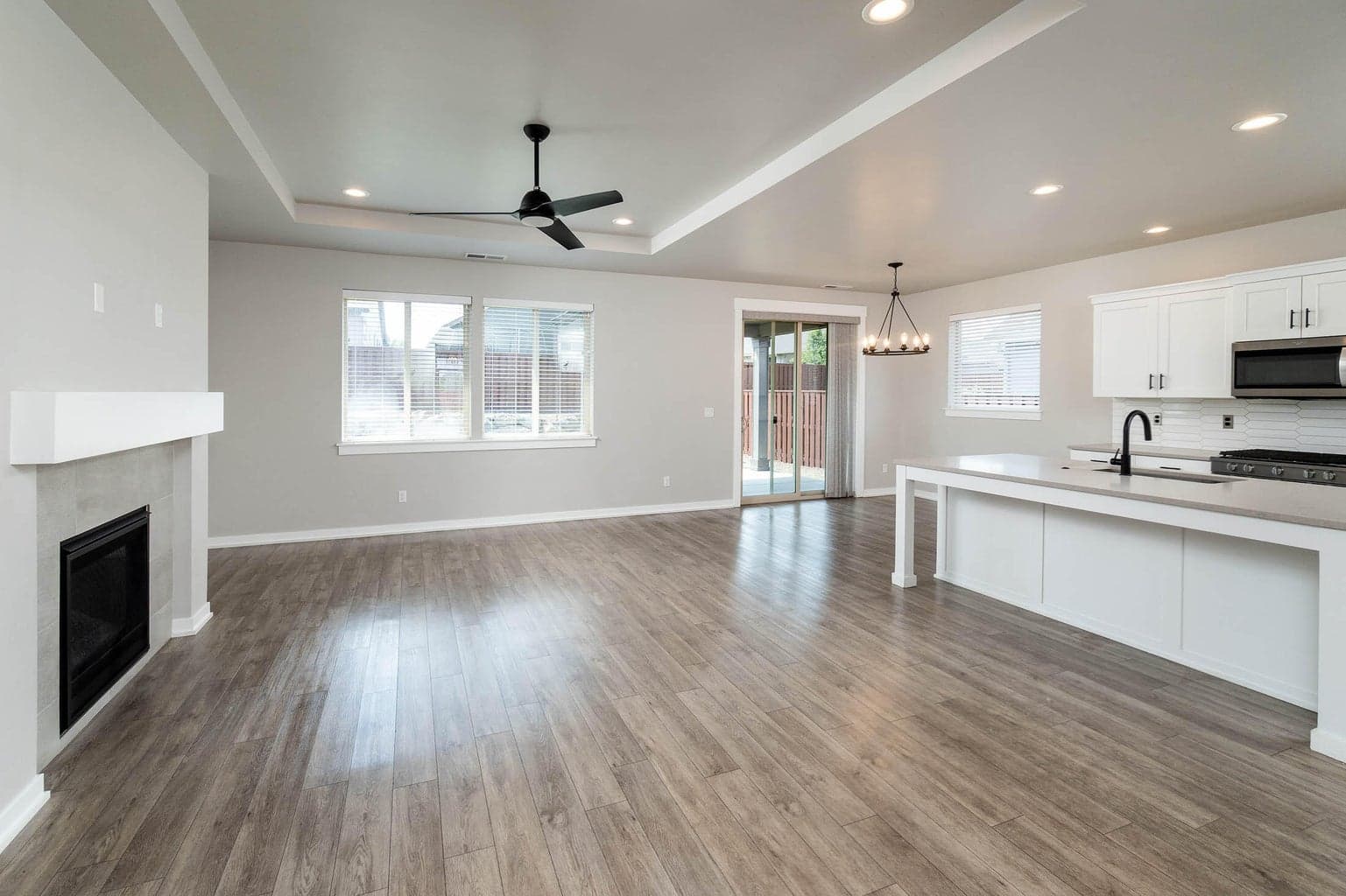 Open concept living room, dining area and kitchen
